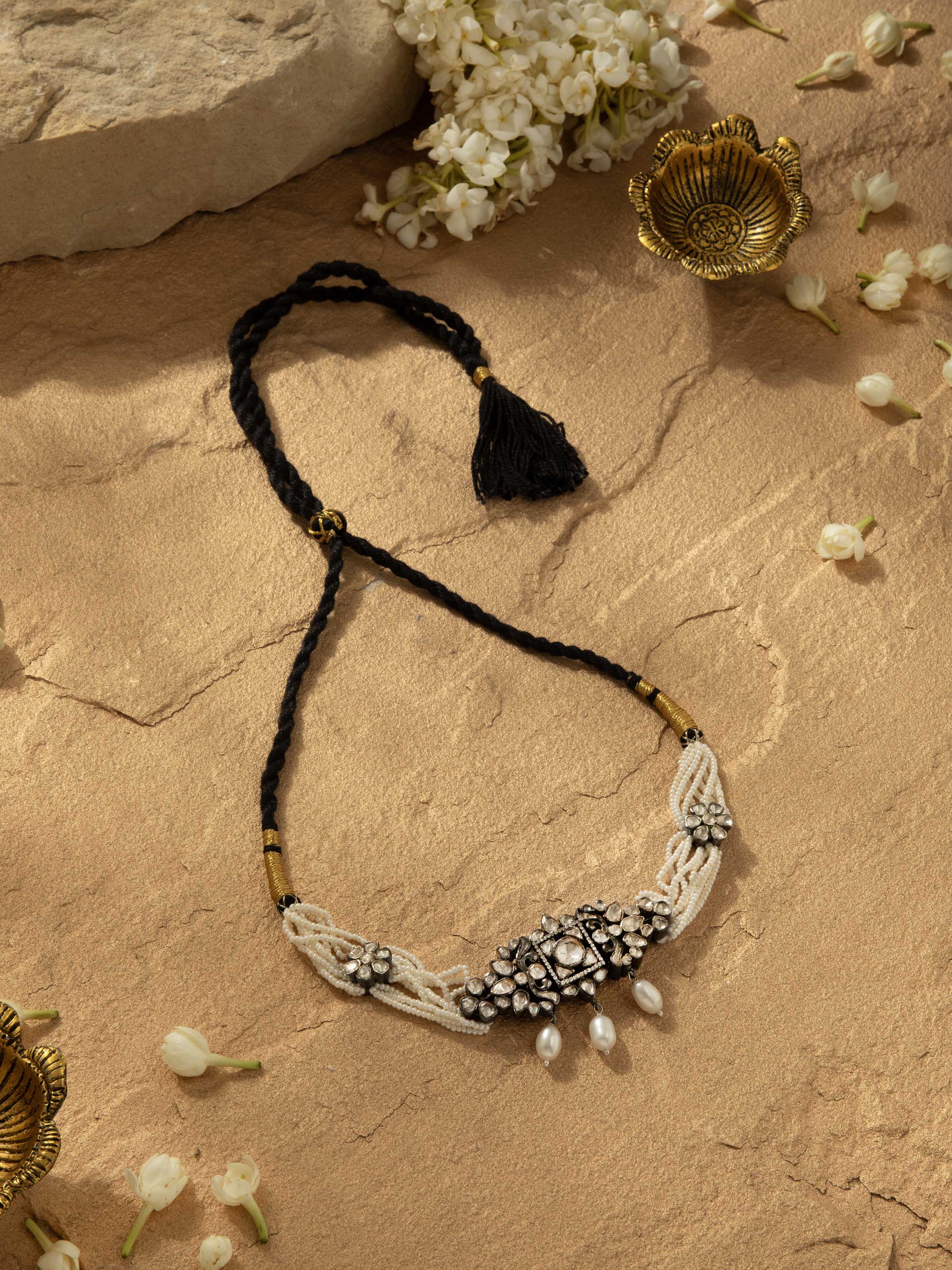 Side view of Silver Smithing Choker emphasizing the smooth curve and polished surface.