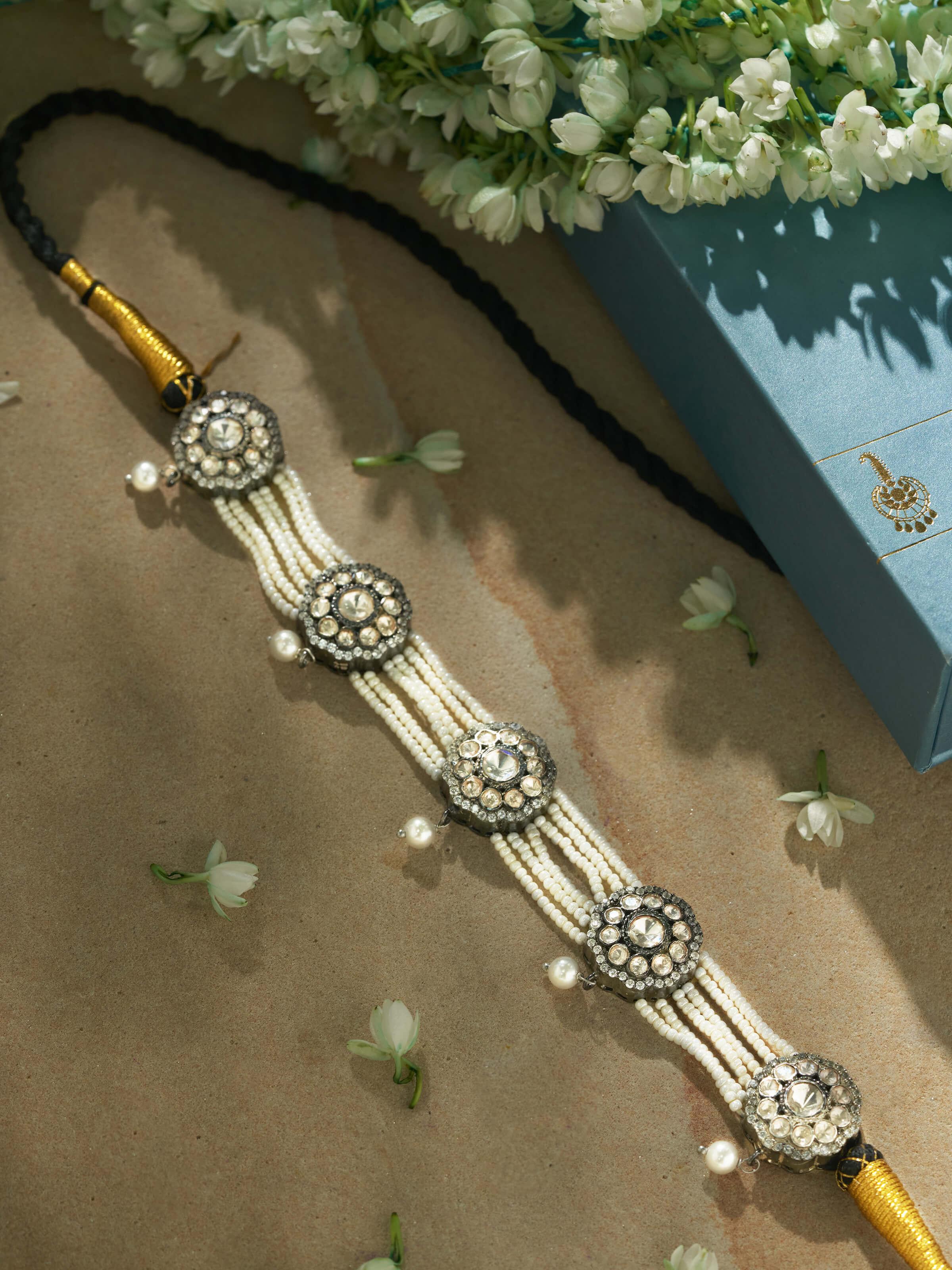 Side view of Silversmithing Choker showcasing the elegant design and intricate silver details.