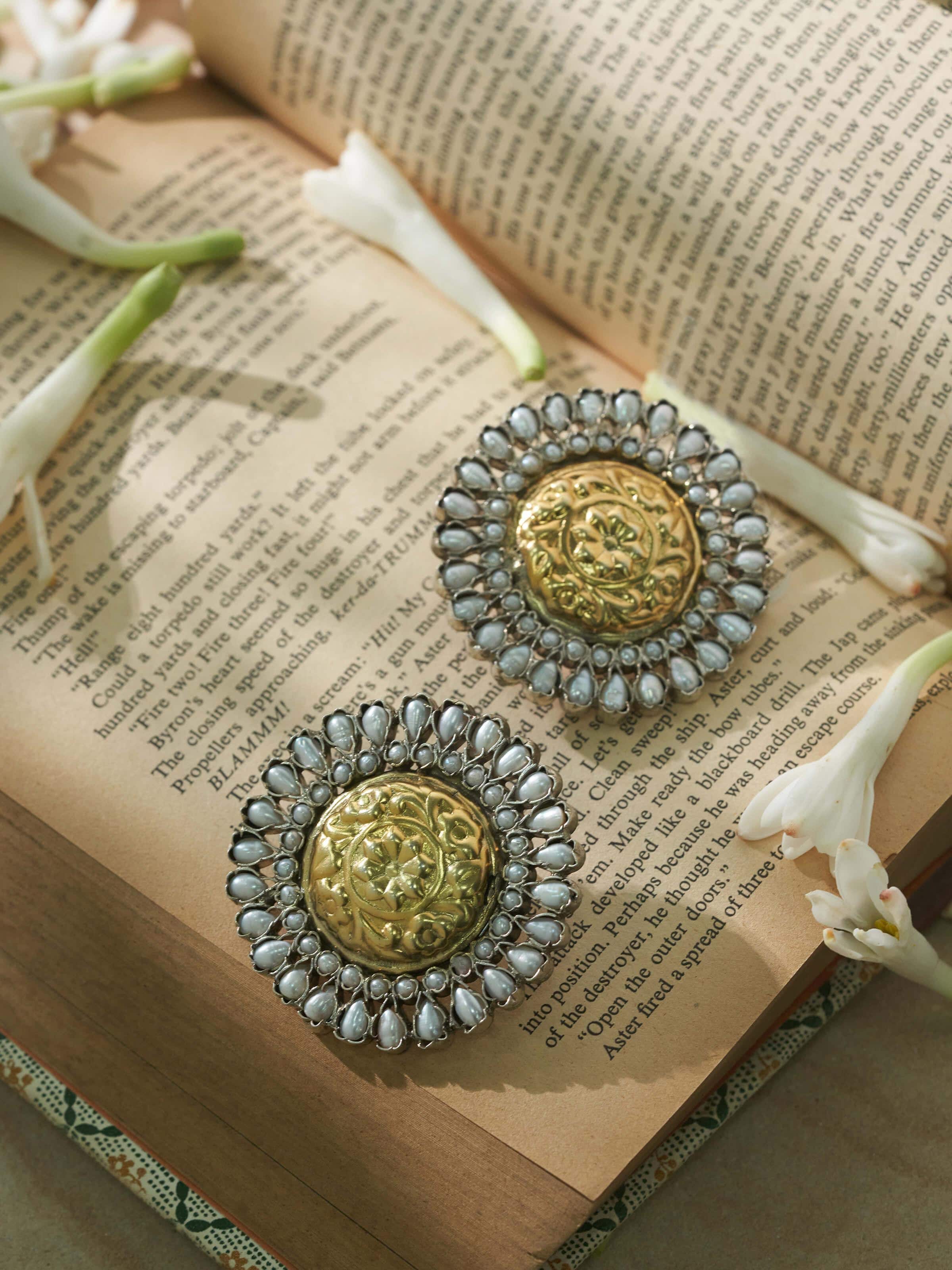 Side view of Chitai Silver Studs highlighting the traditional design and intricate silver detailing.