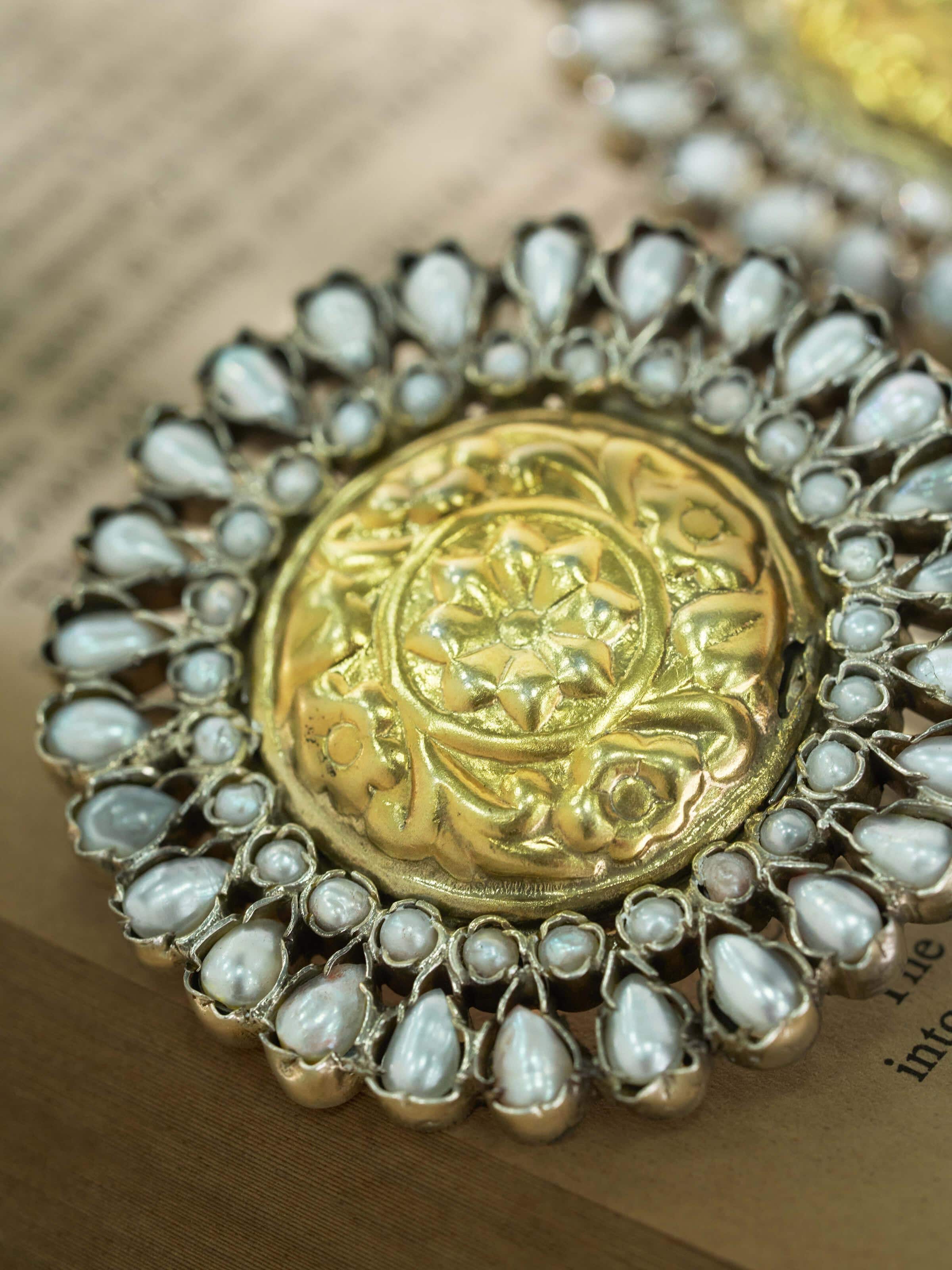 Angled view of Chitai Silver Studs emphasizing the polished finish and detailed design elements.