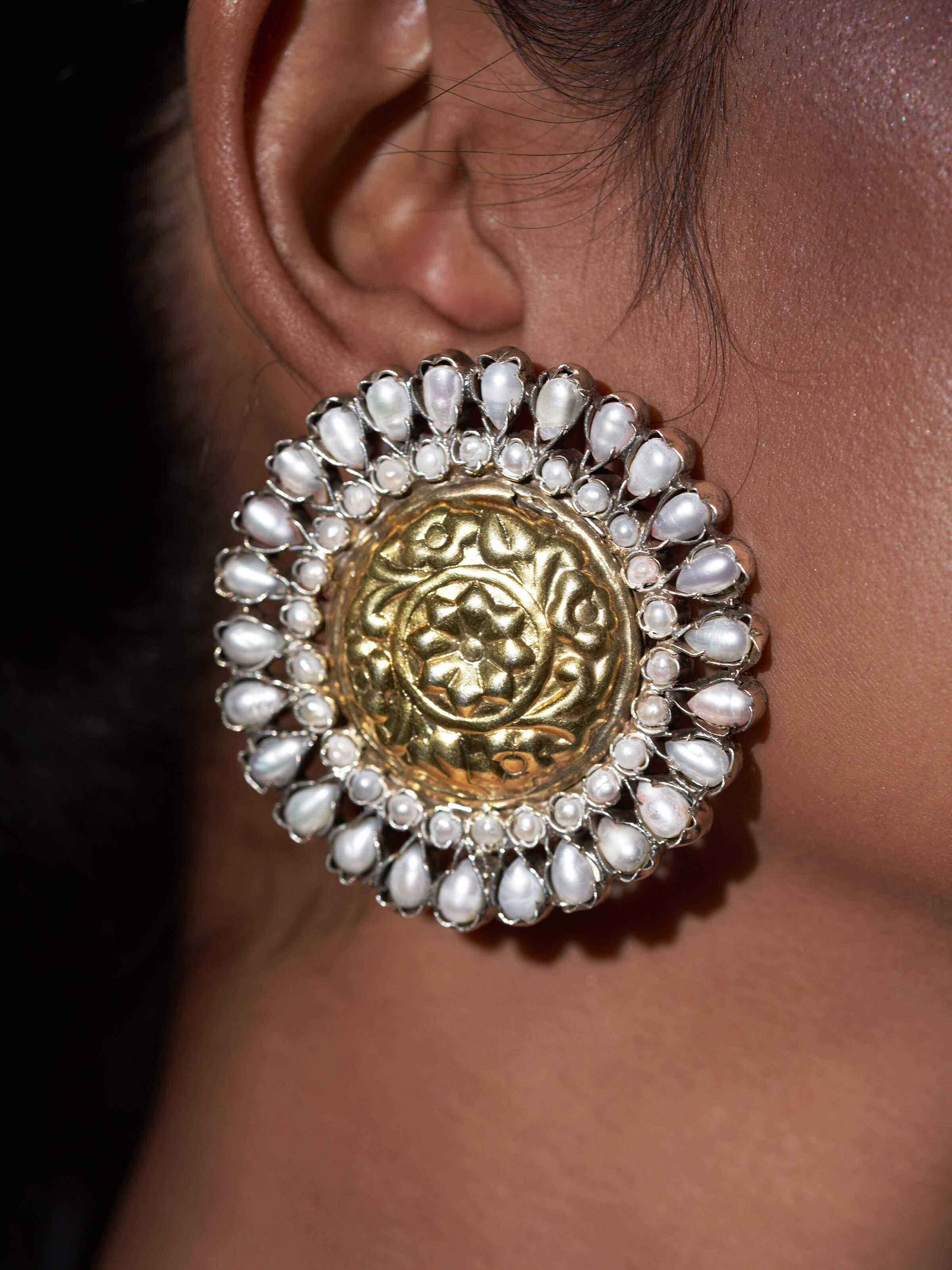 Detailed view of Chitai Silver Studs showcasing the craftsmanship and traditional design.