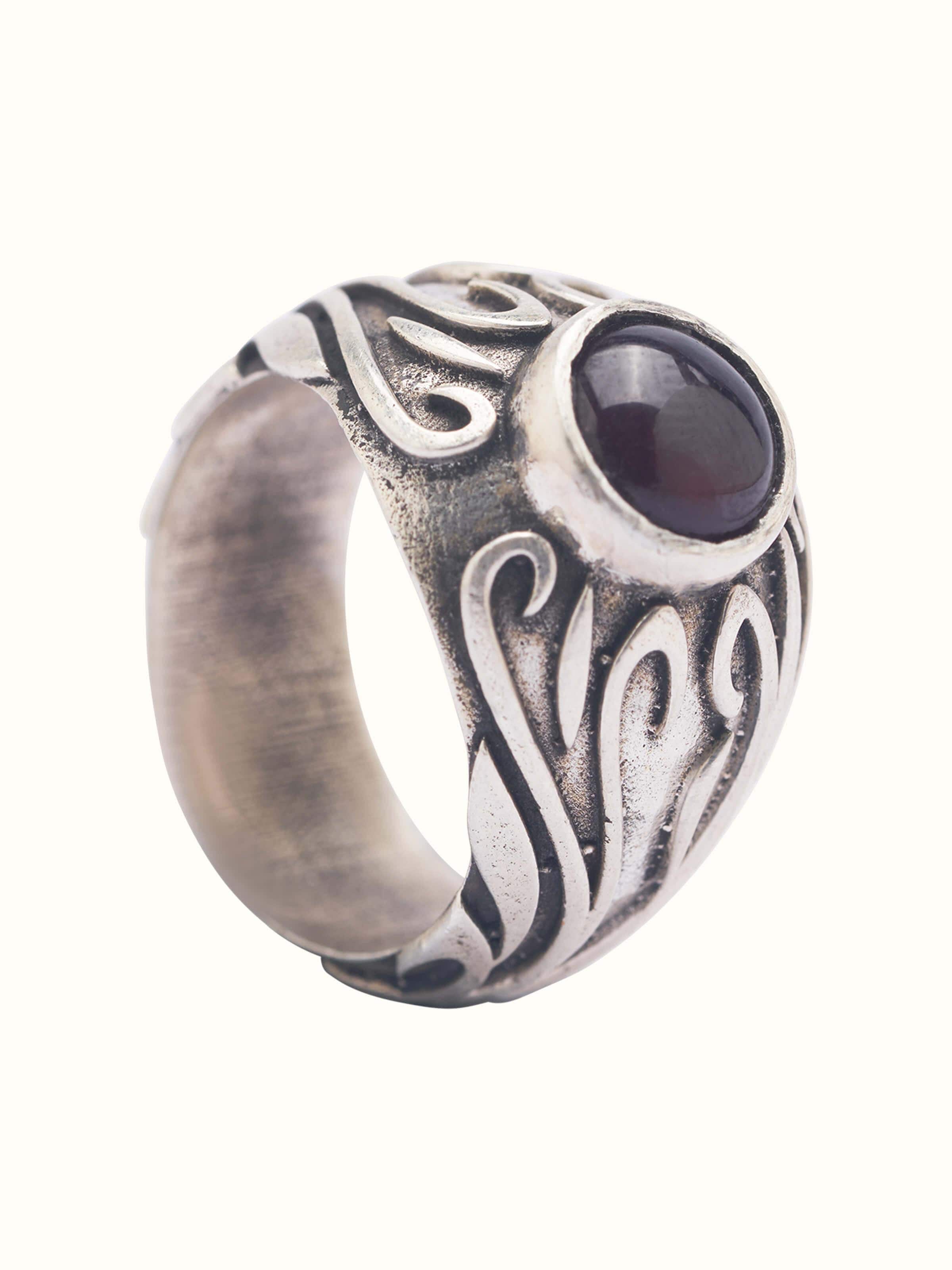 Front view of Chitai silver ring featuring intricate traditional design