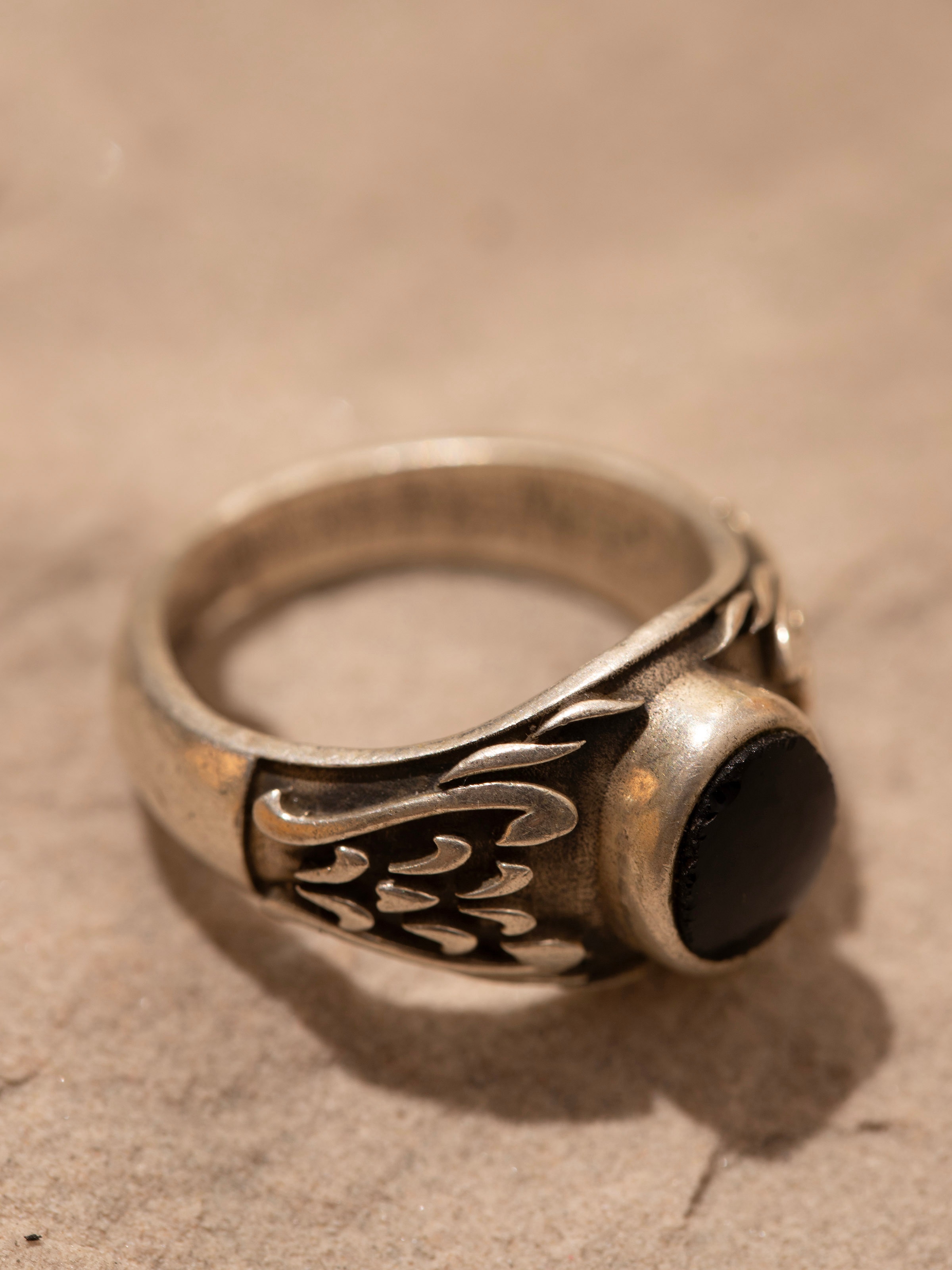 Detailed image of Chitai Silver Ring focusing on the intricate silver design and craftsmanship.