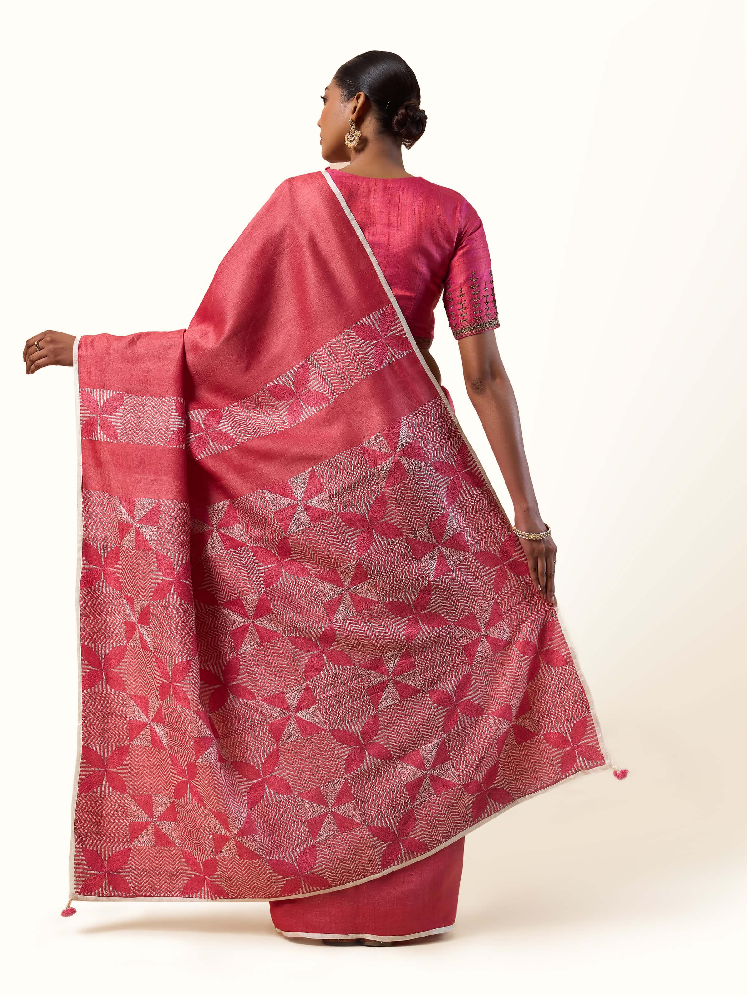 Back view of Tussar Silk Sujani Embroidered Saree highlighting the intricate embroidery patterns