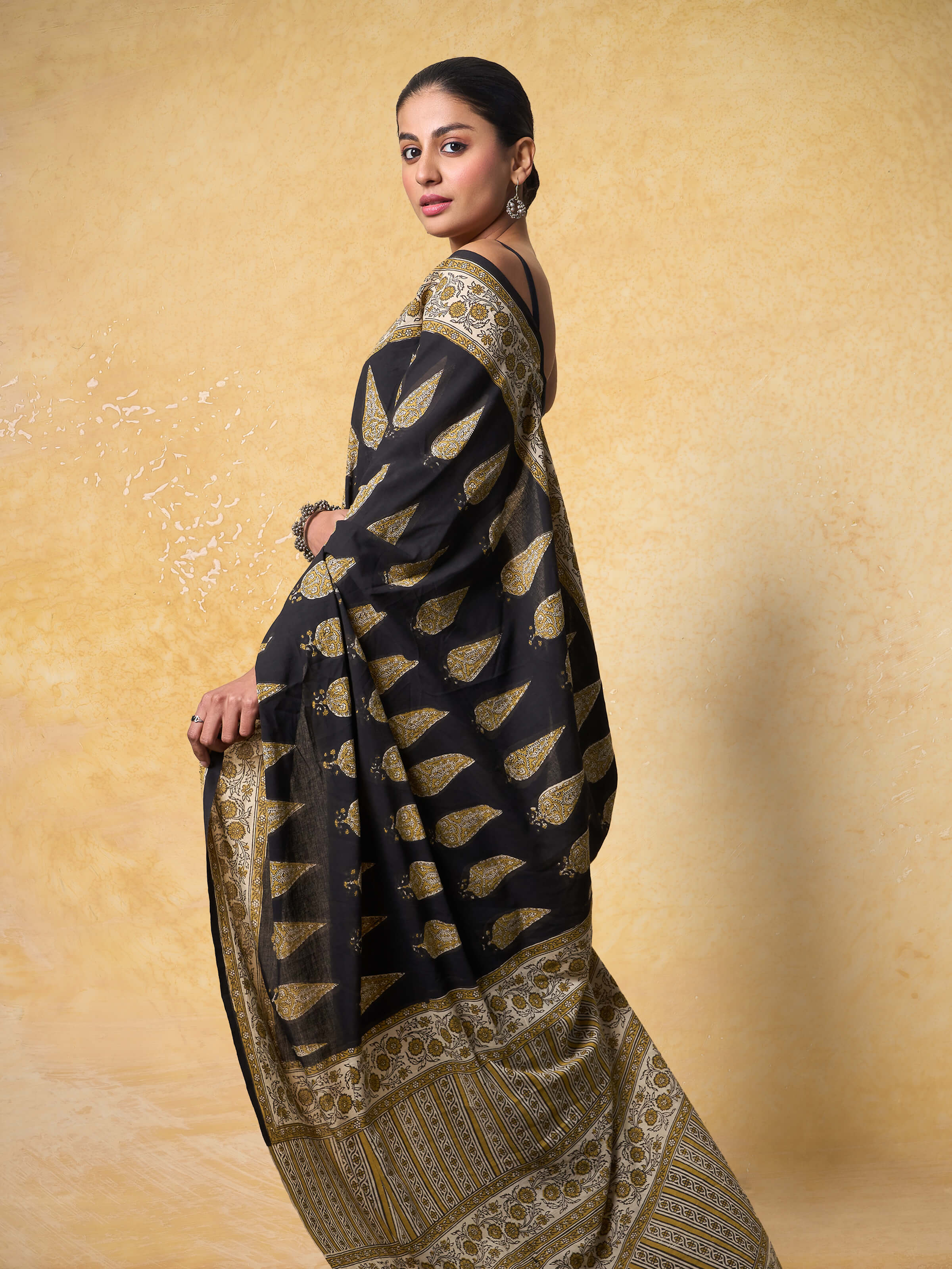 Back view of Cotton Natural Dyed Bagru Block Printed Saree highlighting natural dye colors