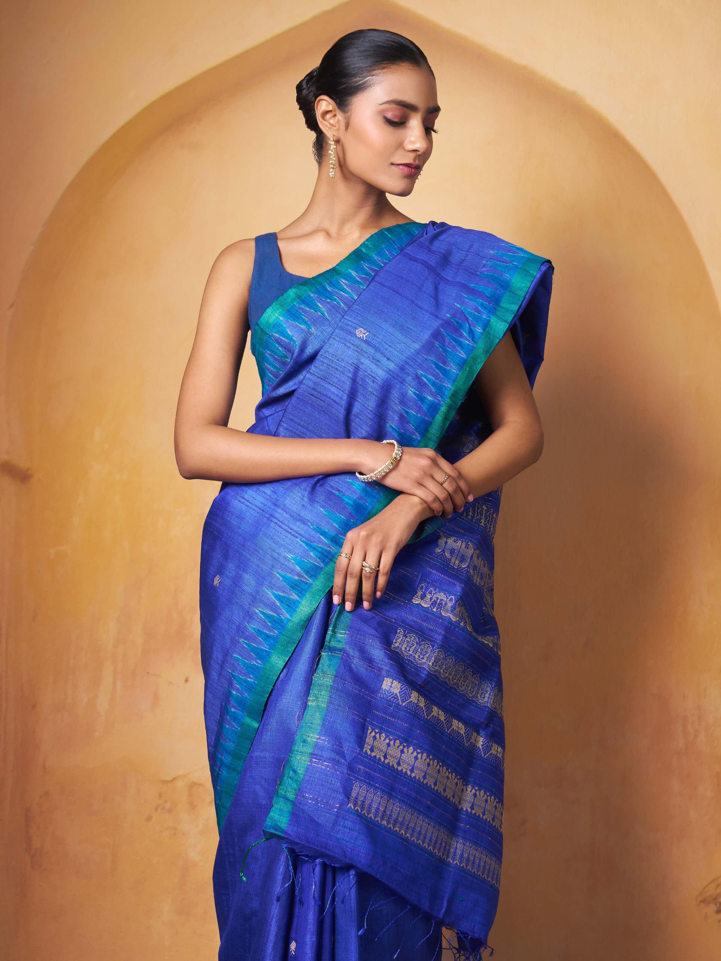 Close-up of Tussar Silk Saree highlighting traditional motifs and smooth fabric texture