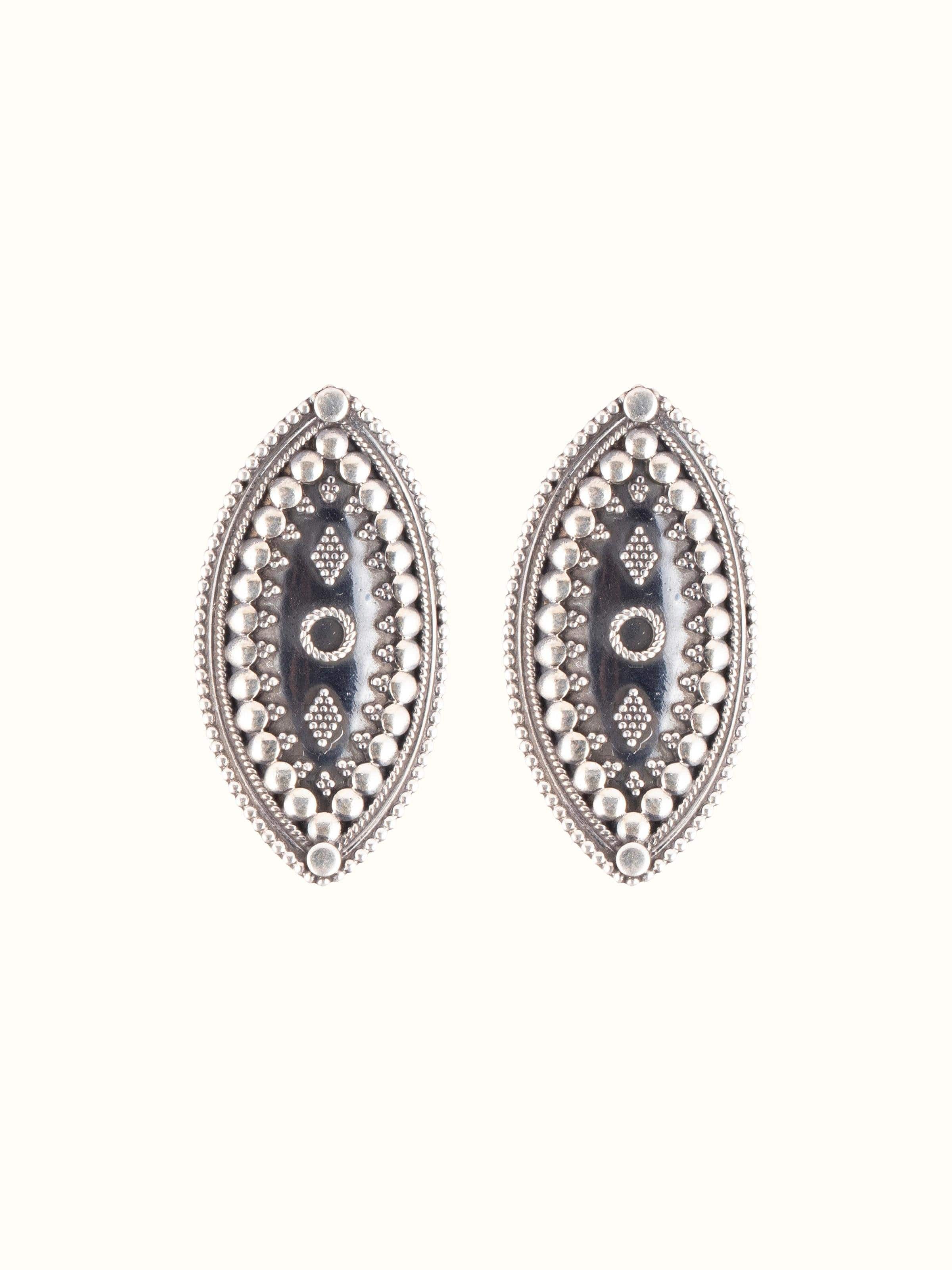 Front view of Silver Smithing Stud Earrings showcasing detailed craftsmanship and shine.