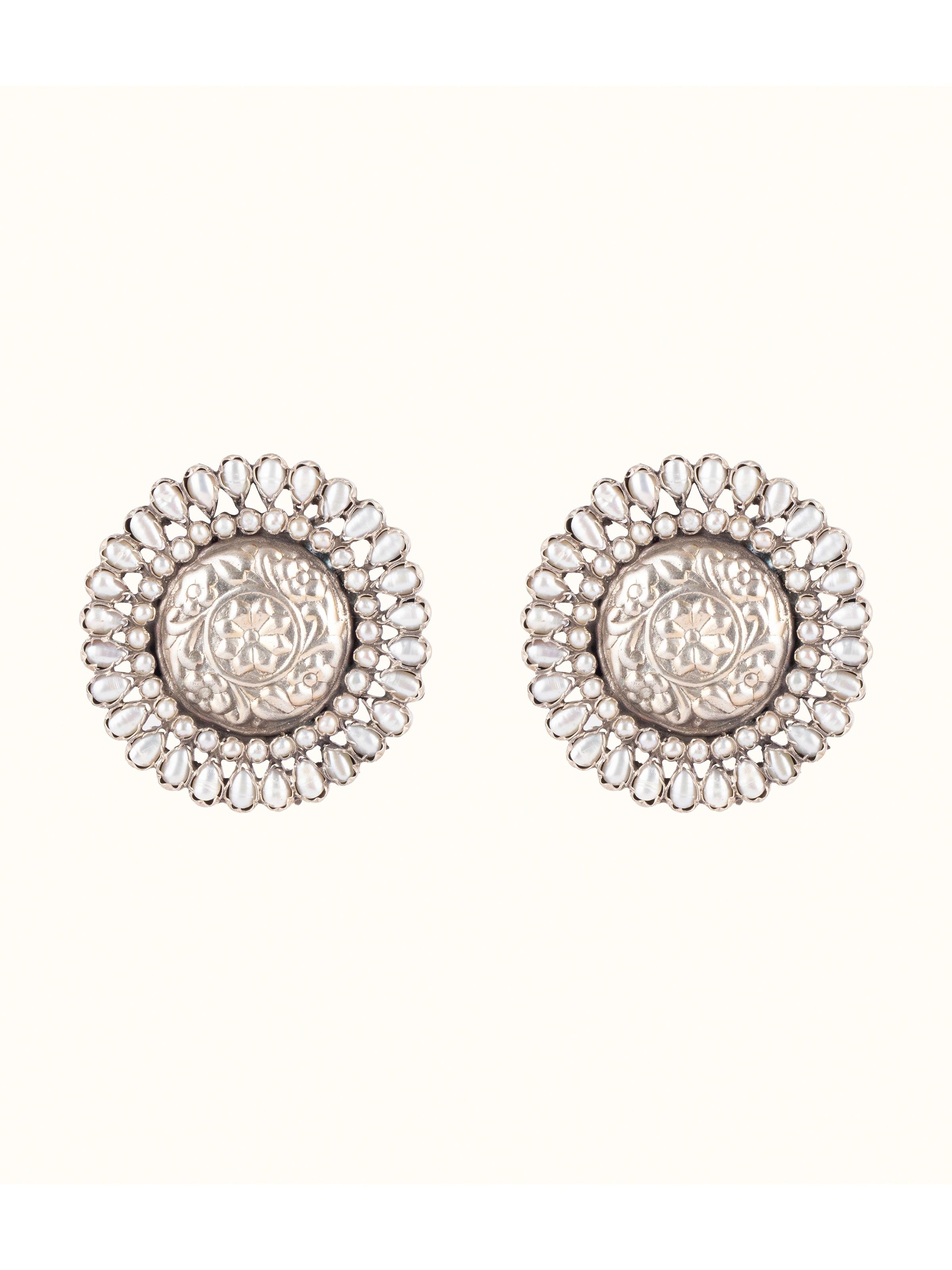 Front view of Silver Smithing Stud Earrings featuring sleek design and fine silver craftsmanship.