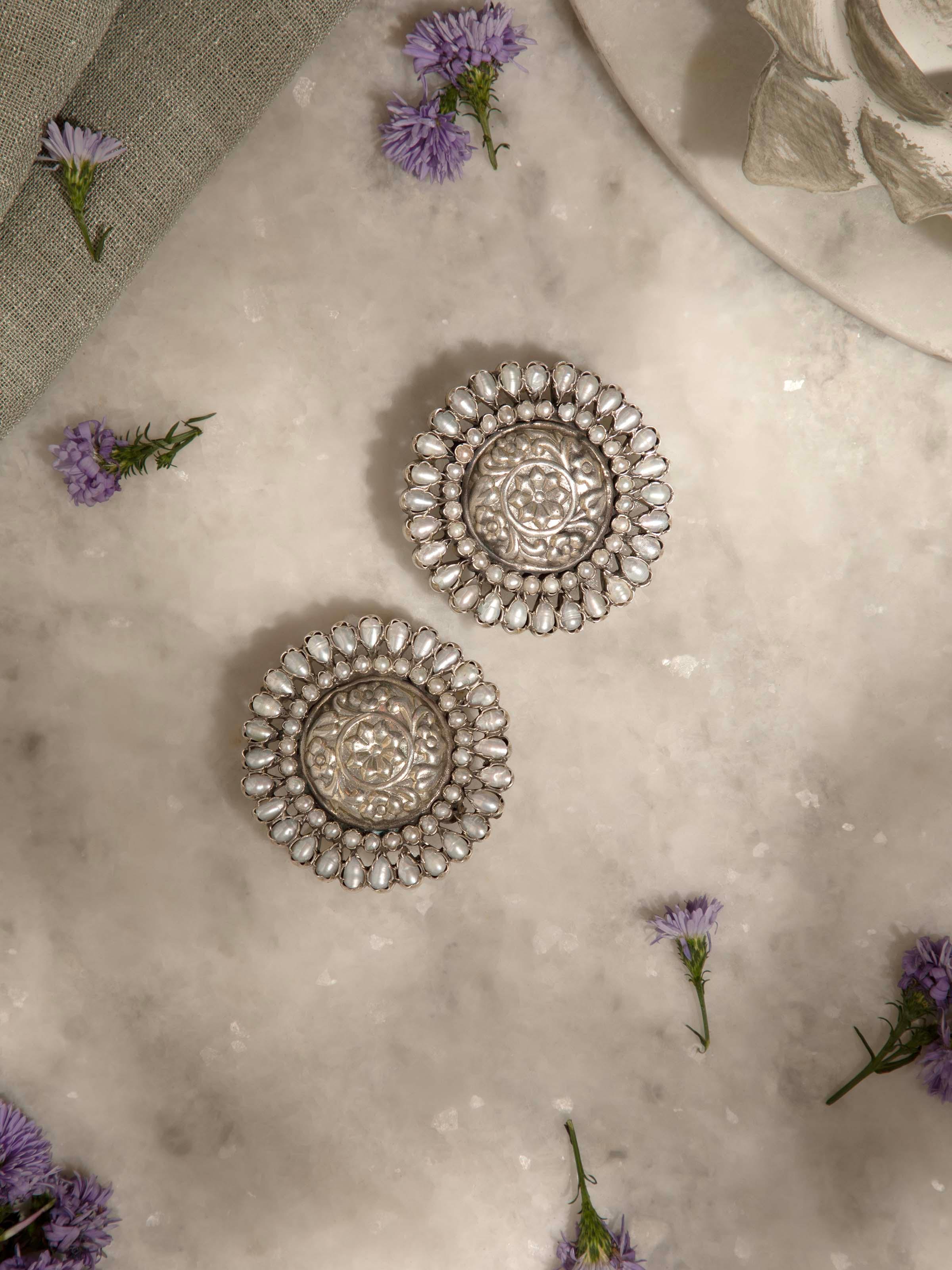 Detailed view of Silver Smithing Stud Earrings focusing on precise silver smithing techniques.