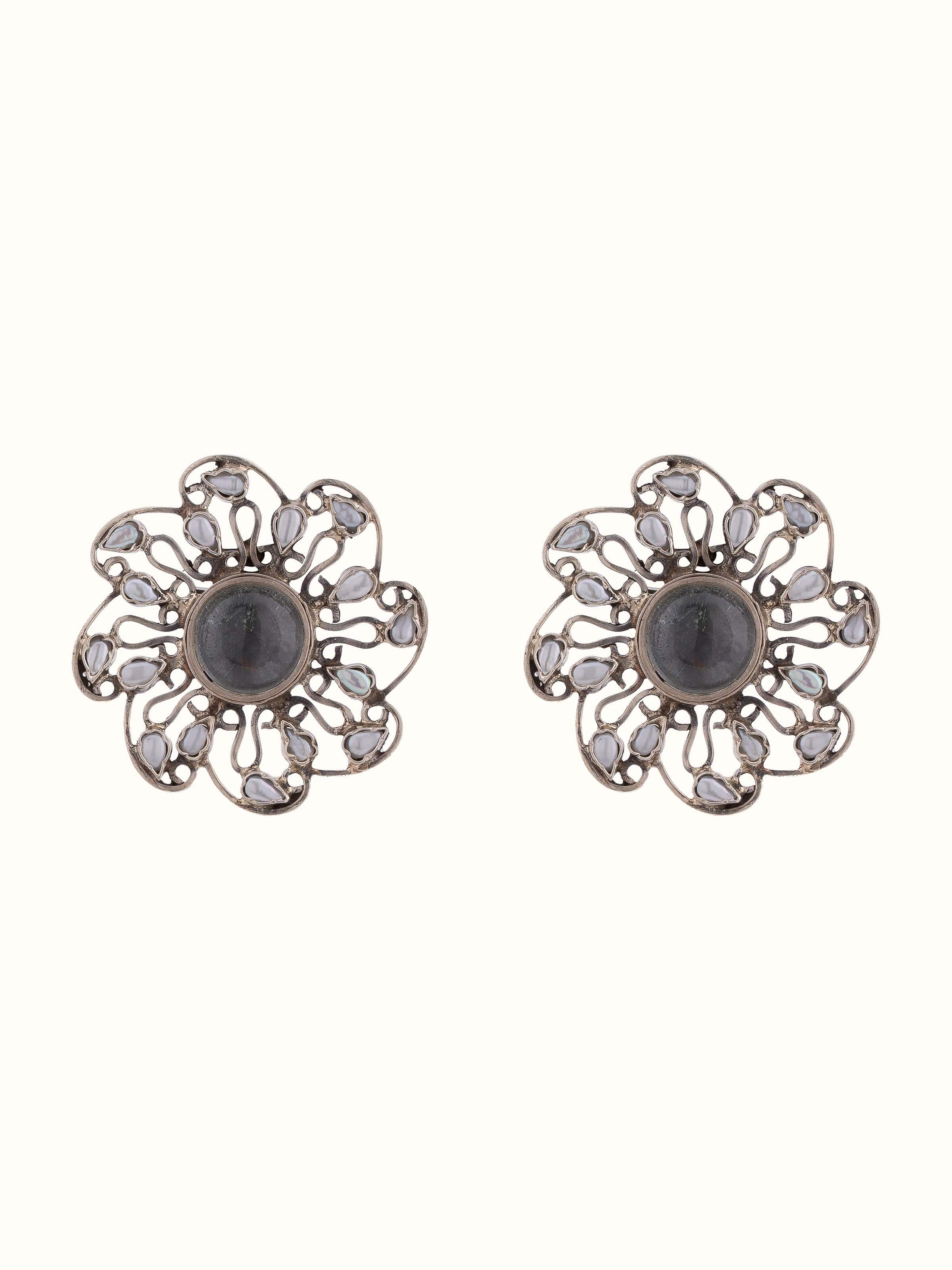 Front view of Silver Smithing Stud Earrings showing detailed silver work