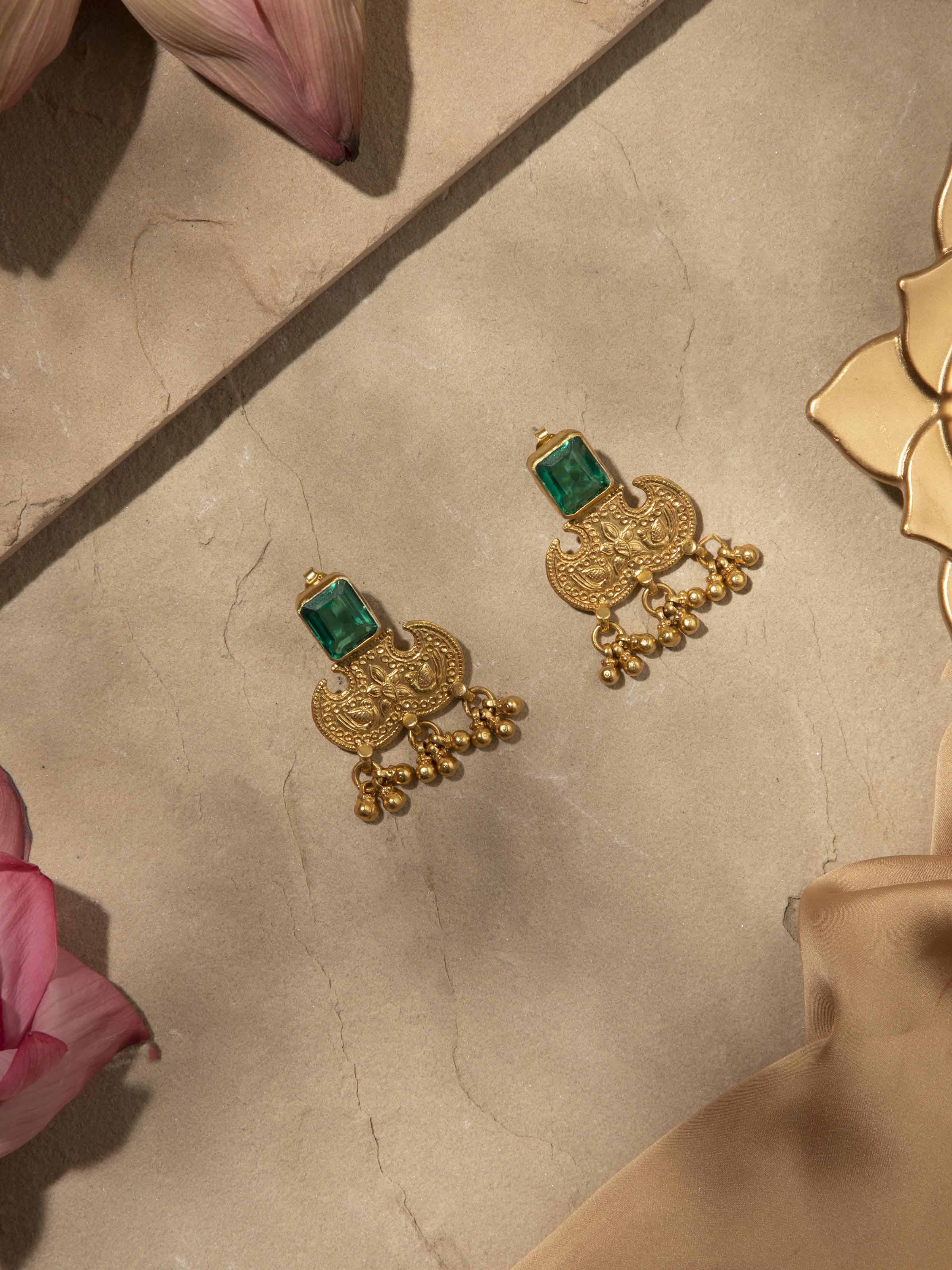 Angled view of Silver Smithing Drop Earrings showcasing the elegant dangle and silver craftsmanship.