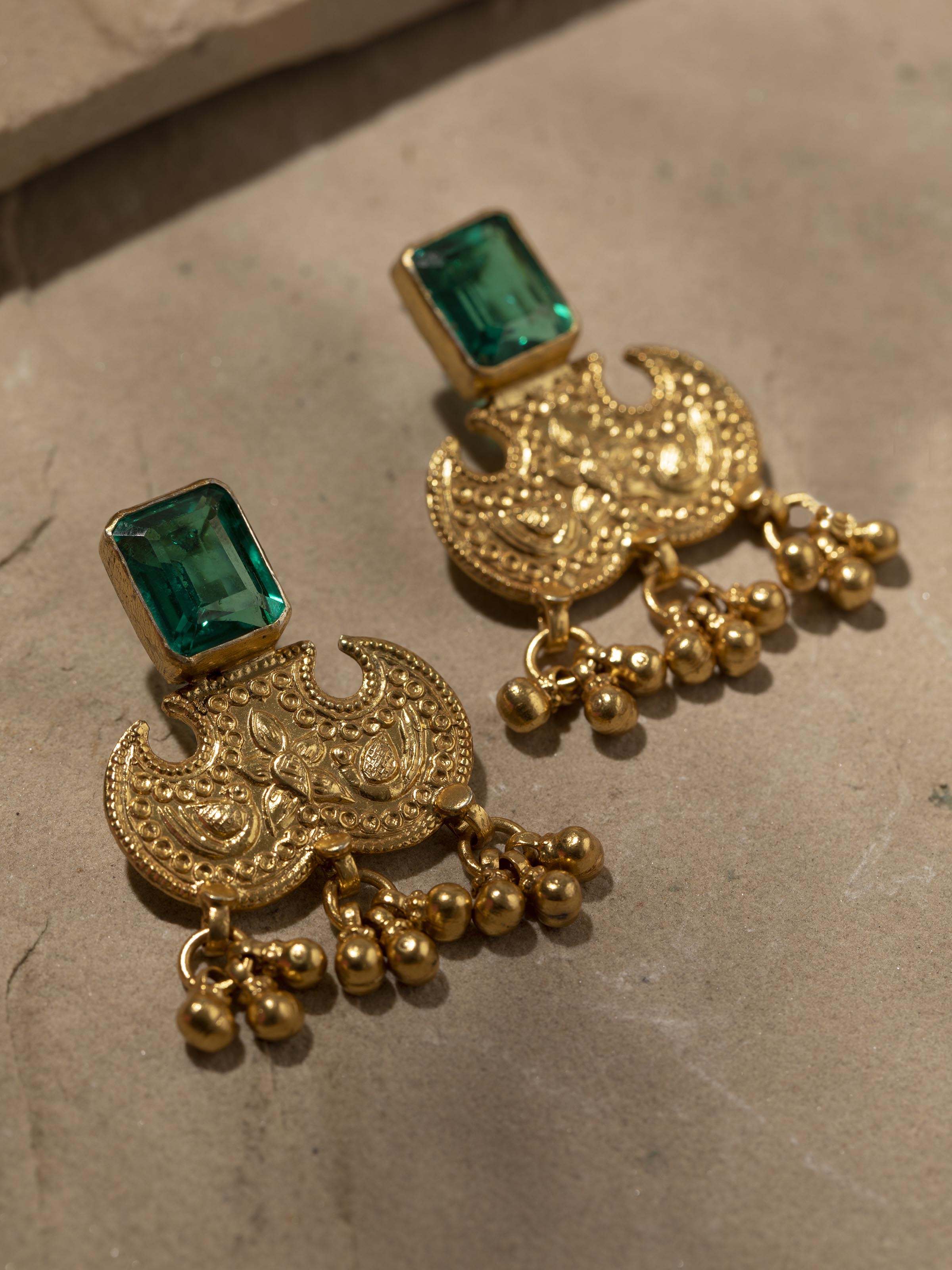 Detailed view of Silver Smithing Drop Earrings from a distance, highlighting the full design and detailing.