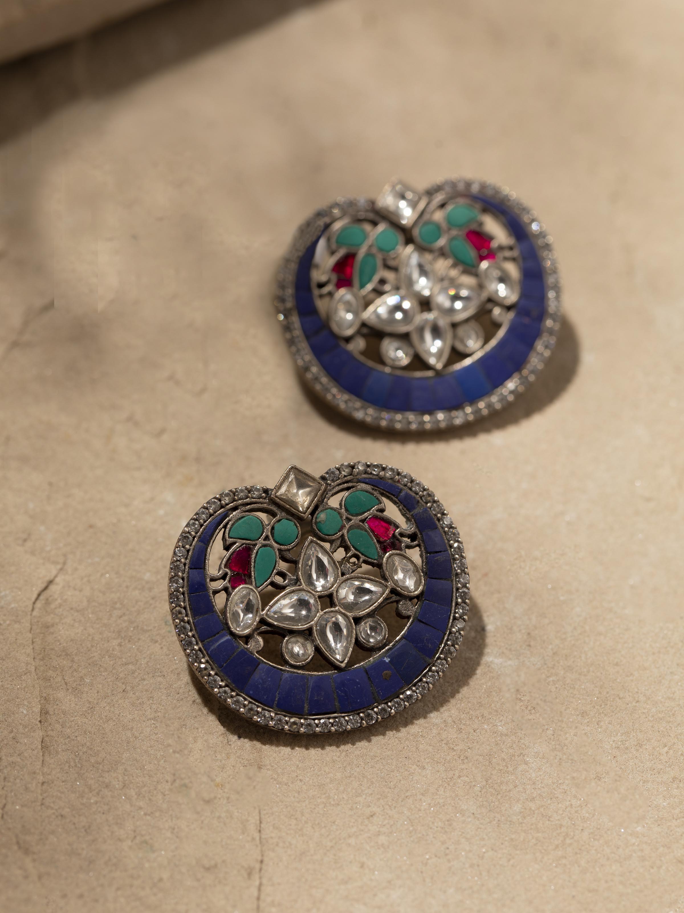 Back view of Smithing Stud Earrings showing clasp and design features.