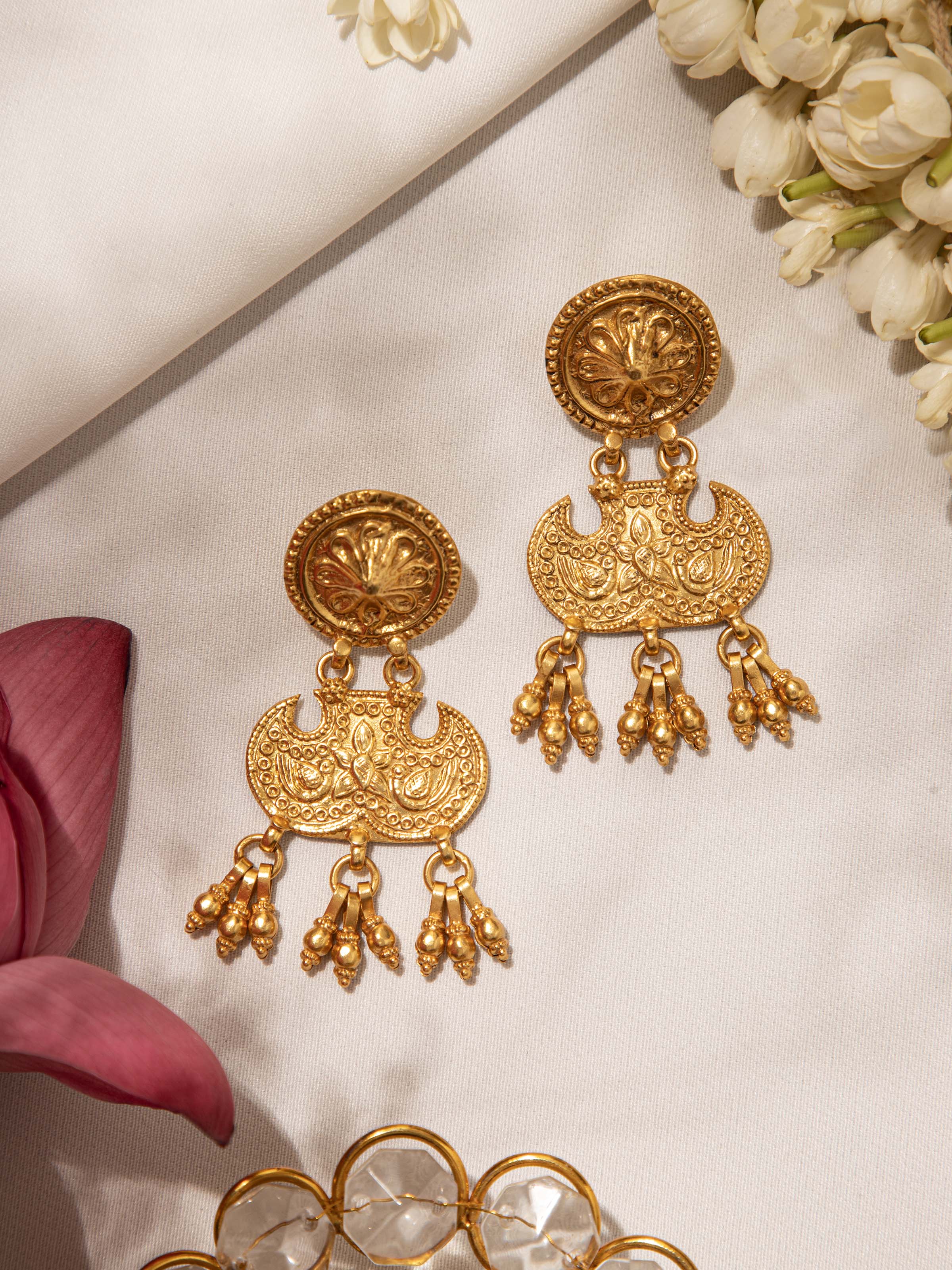 Side view of Silver Smithing Drop Earrings highlighting the refined drop design and silver detailing by Swadesh