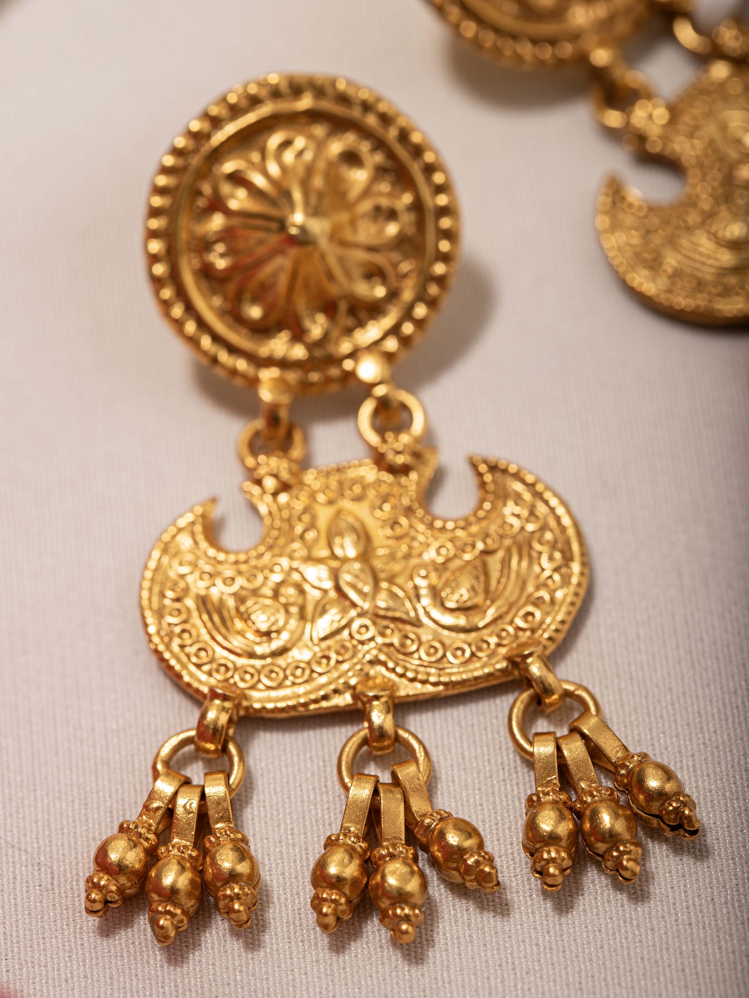 Close-up view of Silver Smithing Drop Earrings showcasing detailed silverwork and elegant design by Swadesh