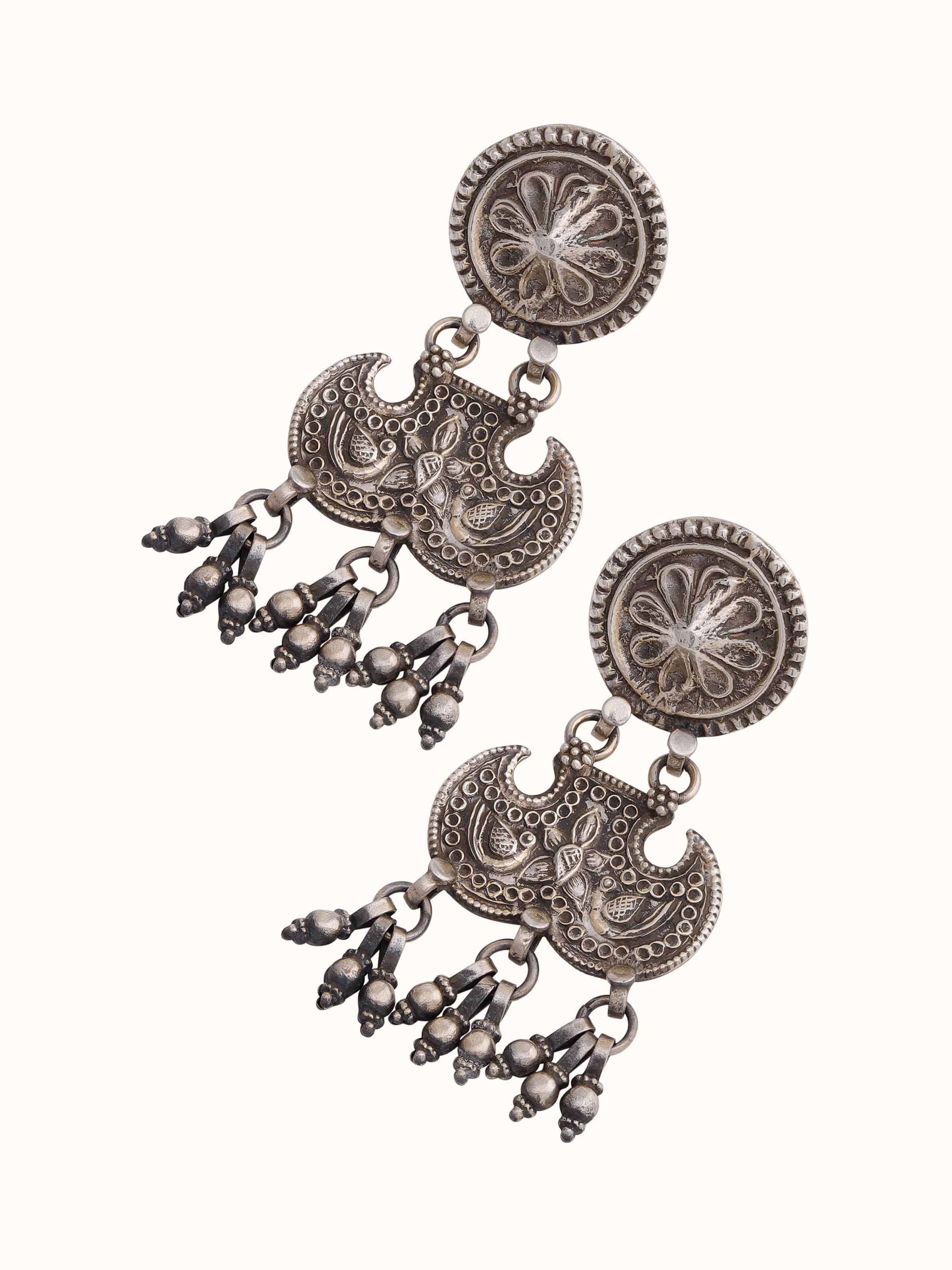 Artistic angle of Smithing Drop Earrings showcasing their sleek design and polished finish.