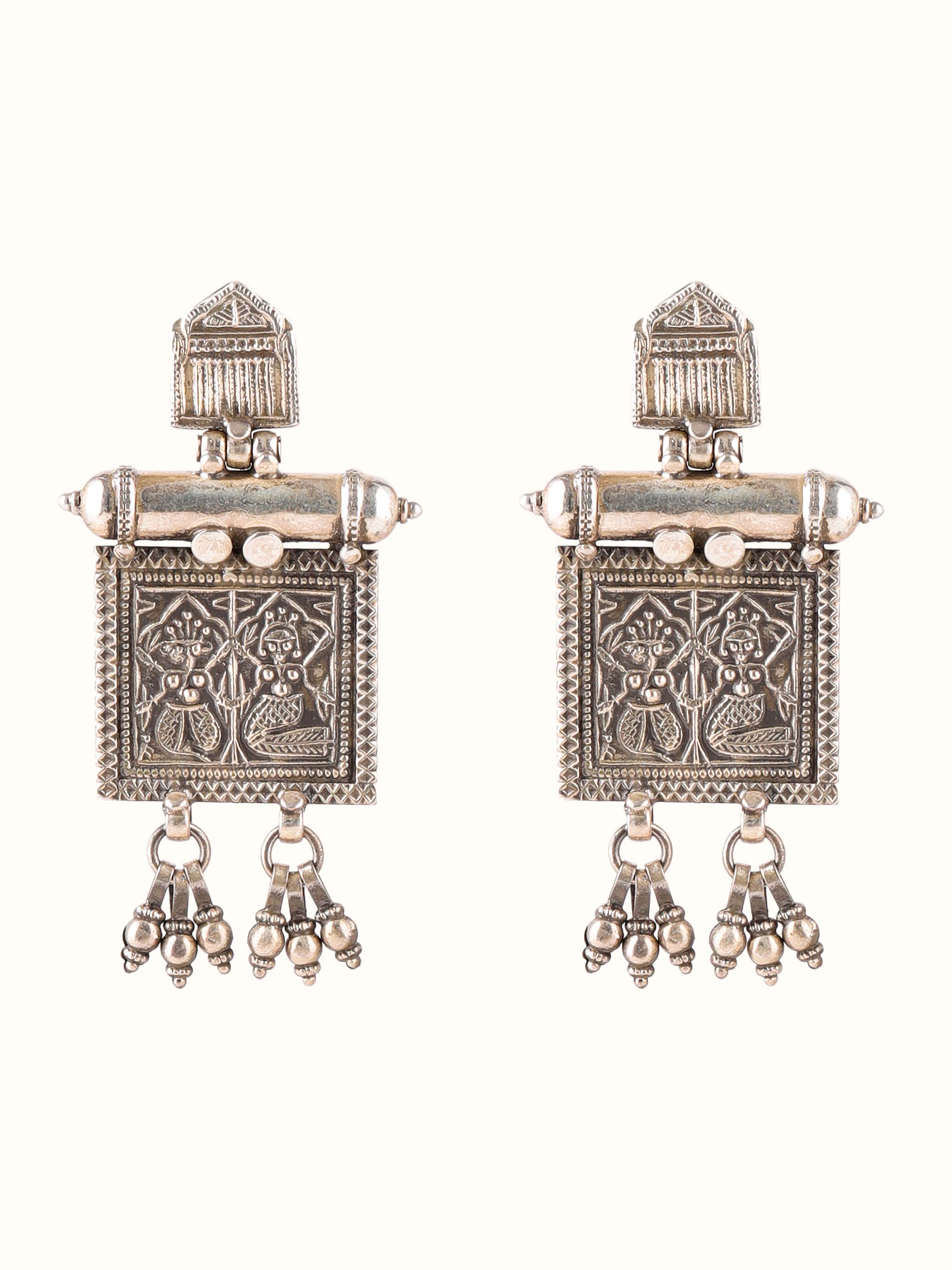 Front view of Smithing Drop Earrings with elegant drop design and detailed metalwork.