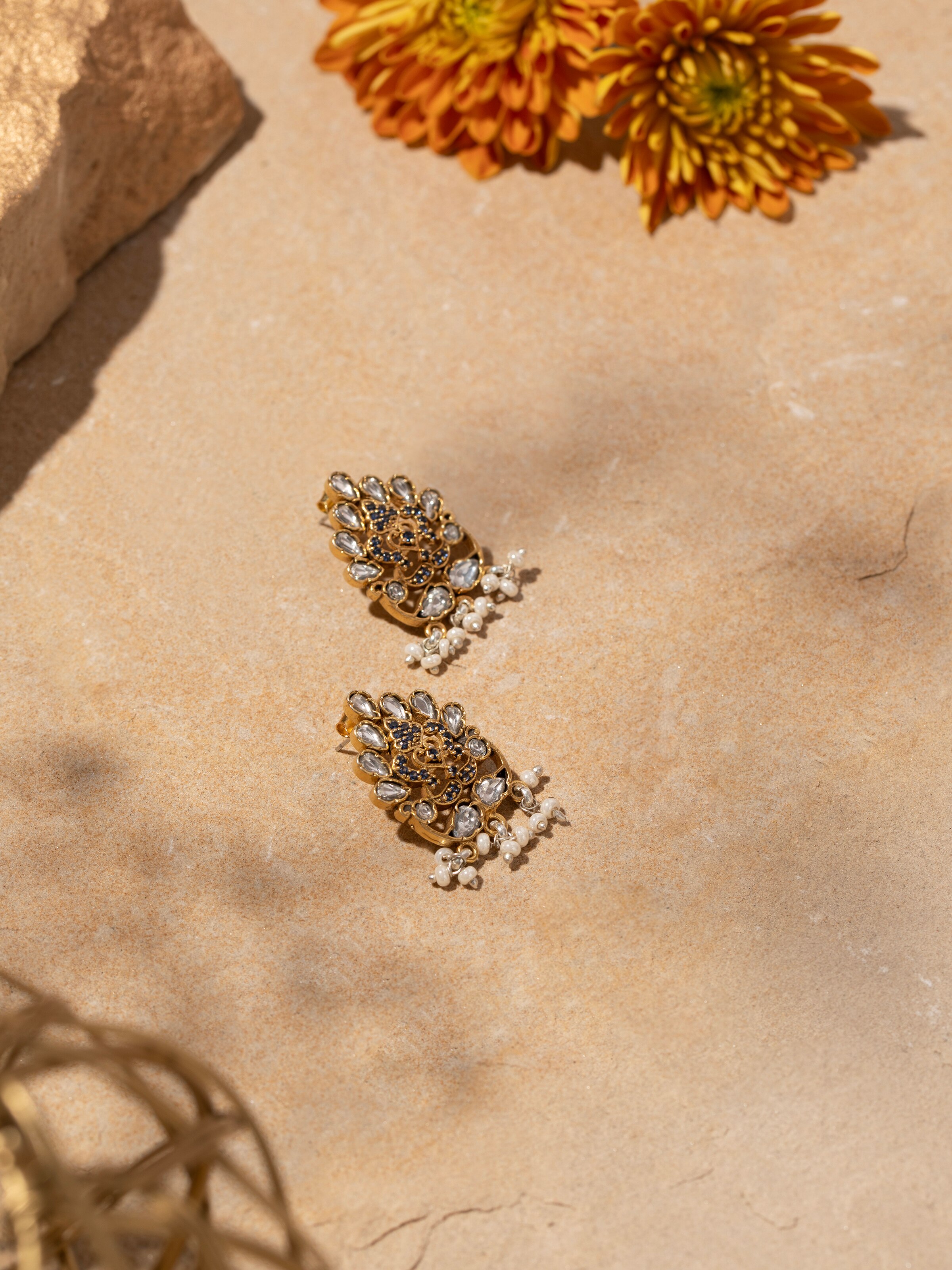 Close-up view of Silver Smithing Stud Earrings highlighting intricate design.