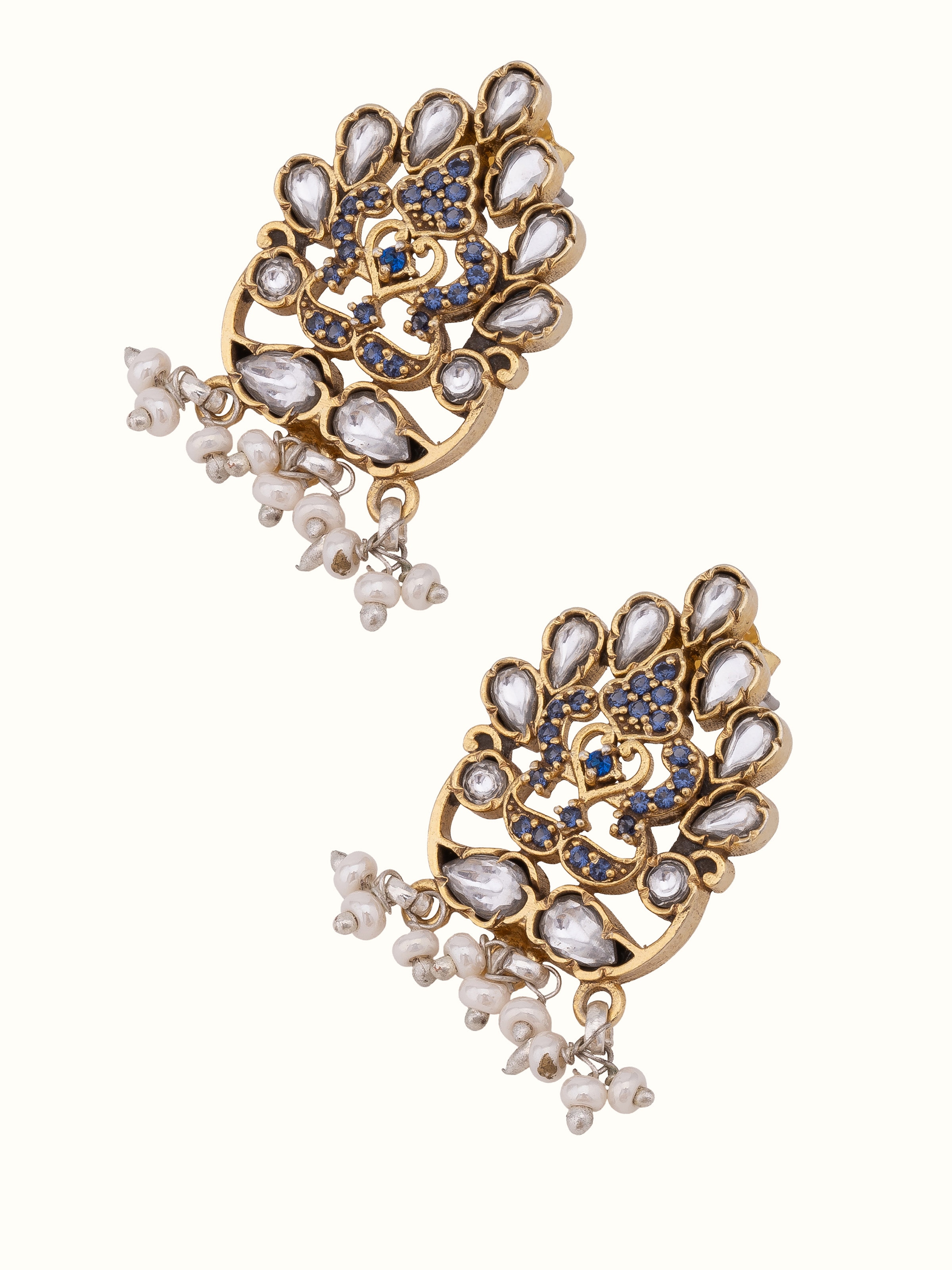 Angled view of Silver Smithing Stud Earrings emphasizing detailed design.