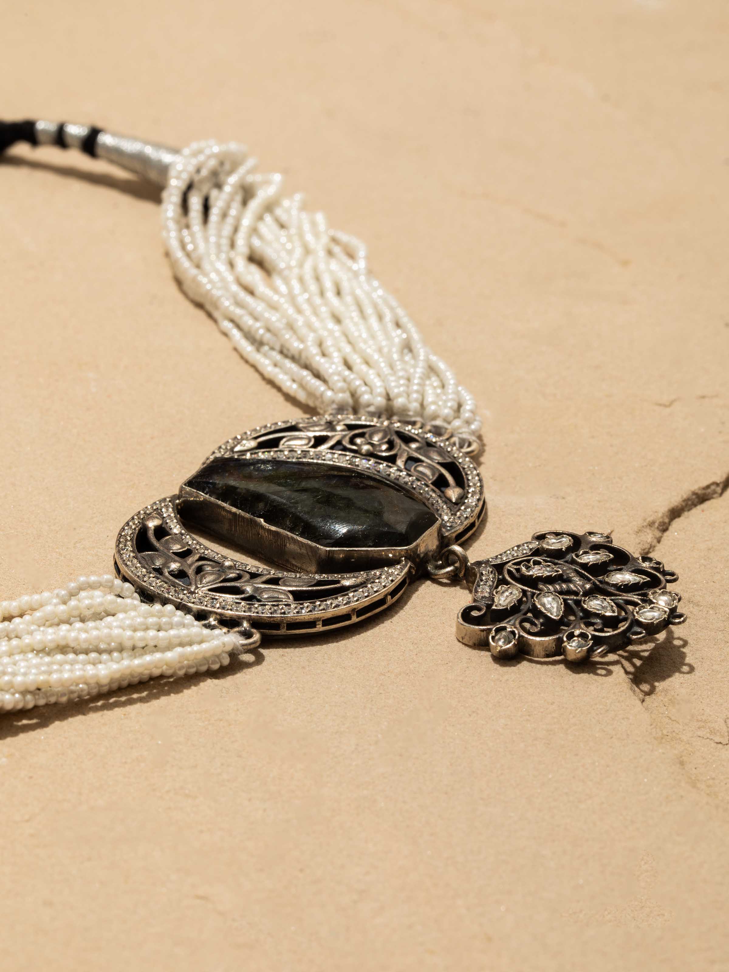 Detailed view of silver smithing choker illustrating its intricate design and high-quality craftsmanship.