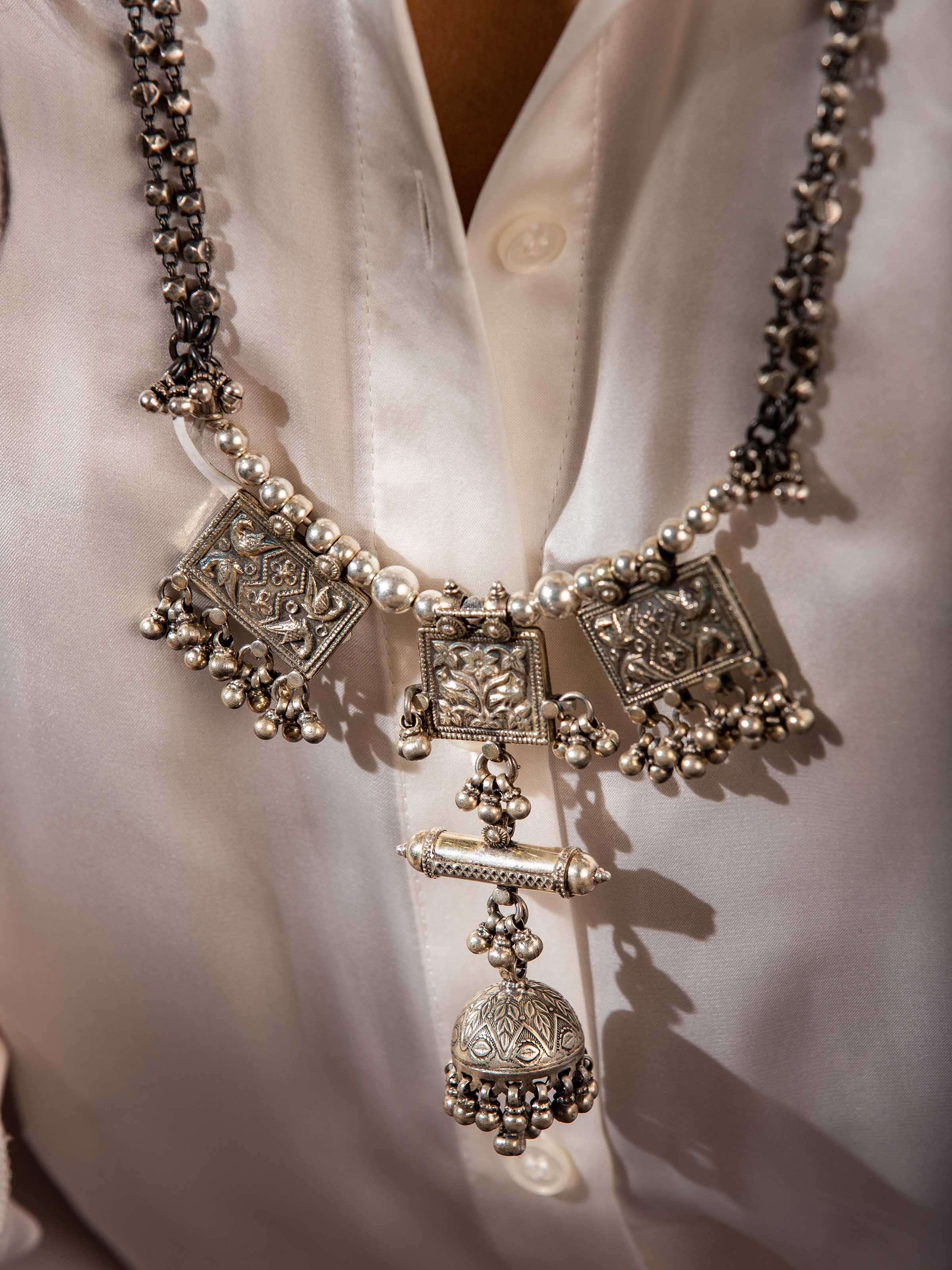 Side view of Silver Smithing Long Necklace showcasing delicate silver detailing by Swadesh