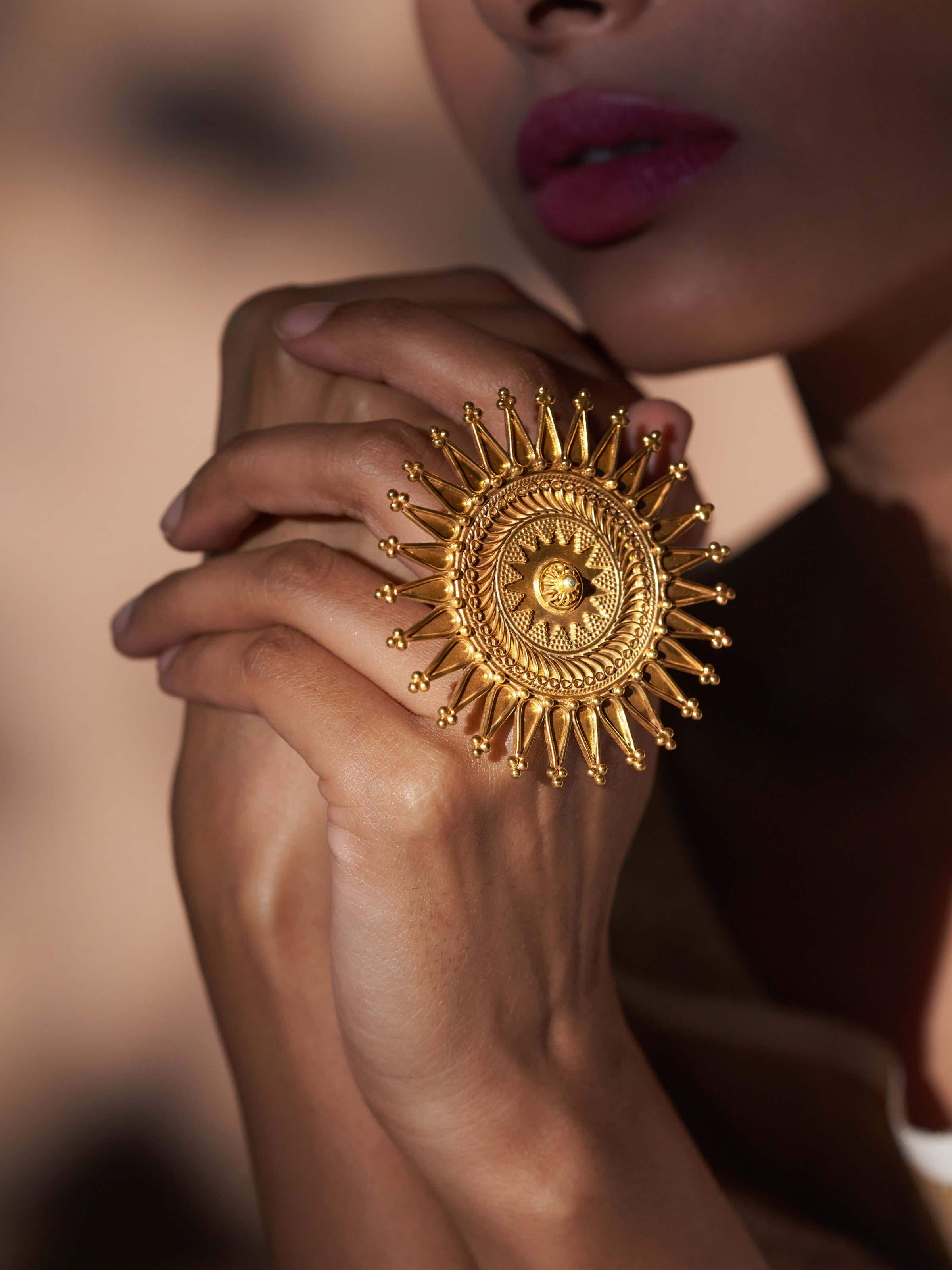 Side view of silver smithing ring showcasing smooth curvature and artisan finish