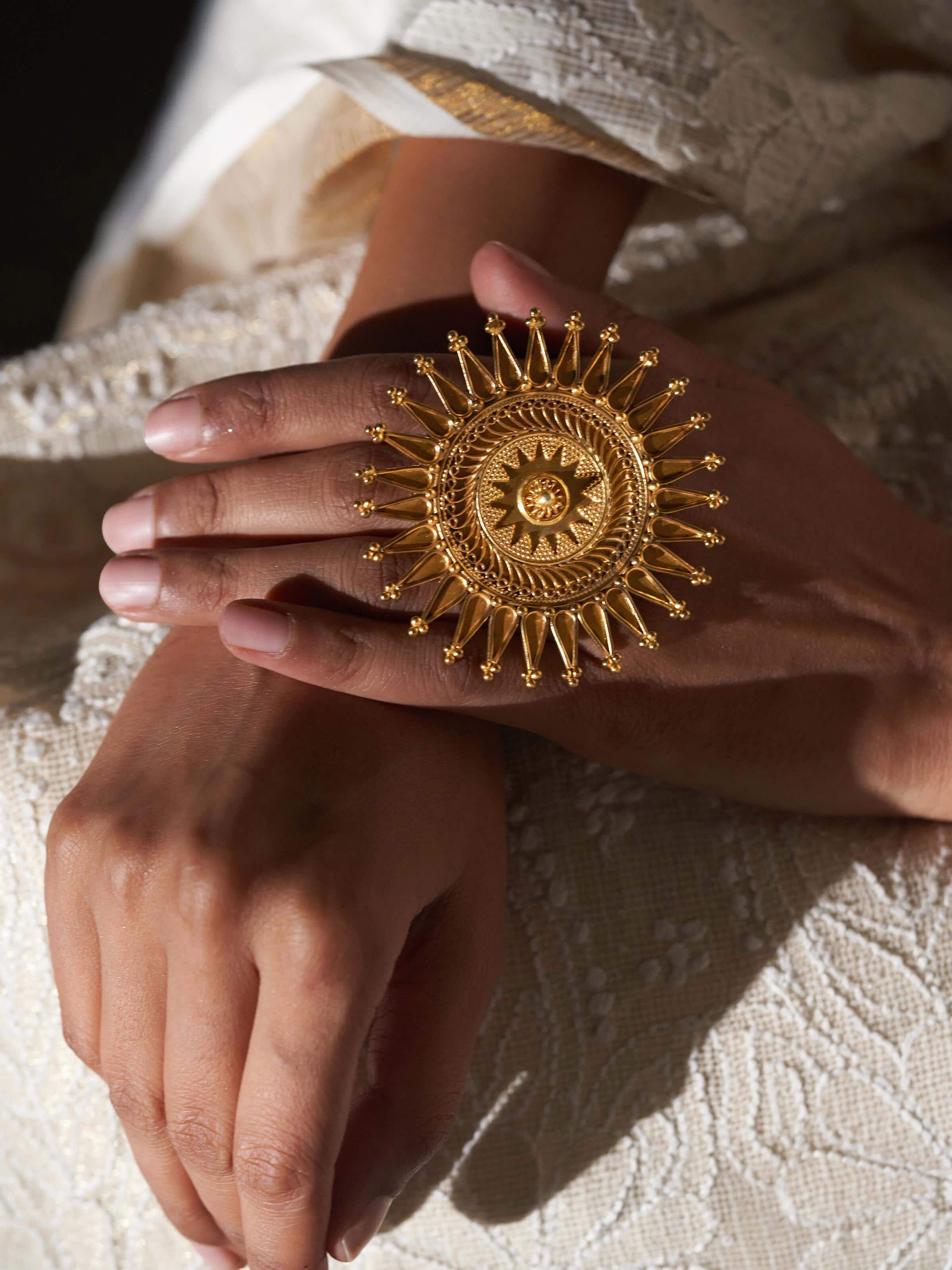 Detailed view of silver smithing ring emphasizing precision metalwork and polished surface