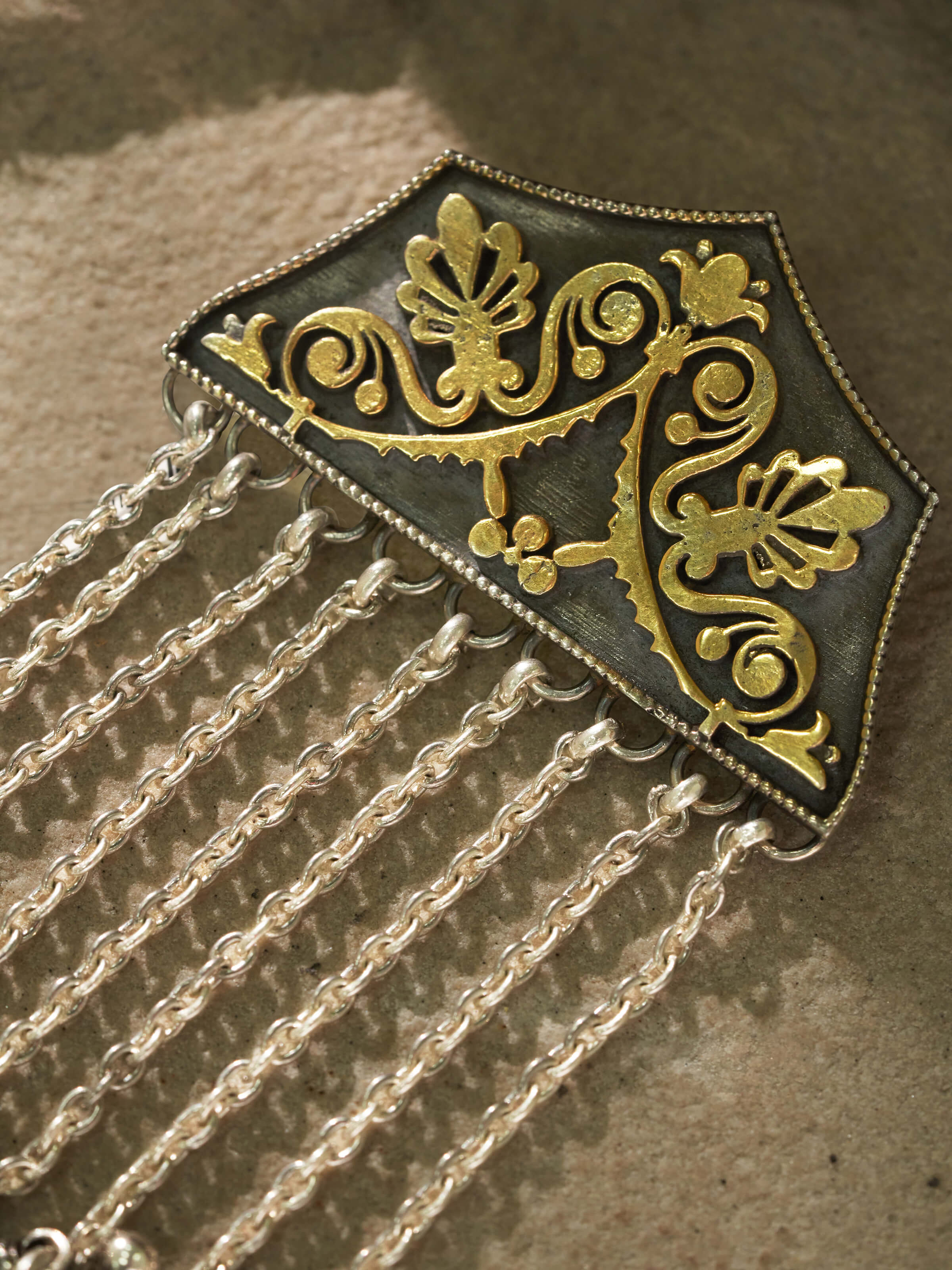 Back view of Silver Smithing Pendant showing the smooth finish and fine craftsmanship.