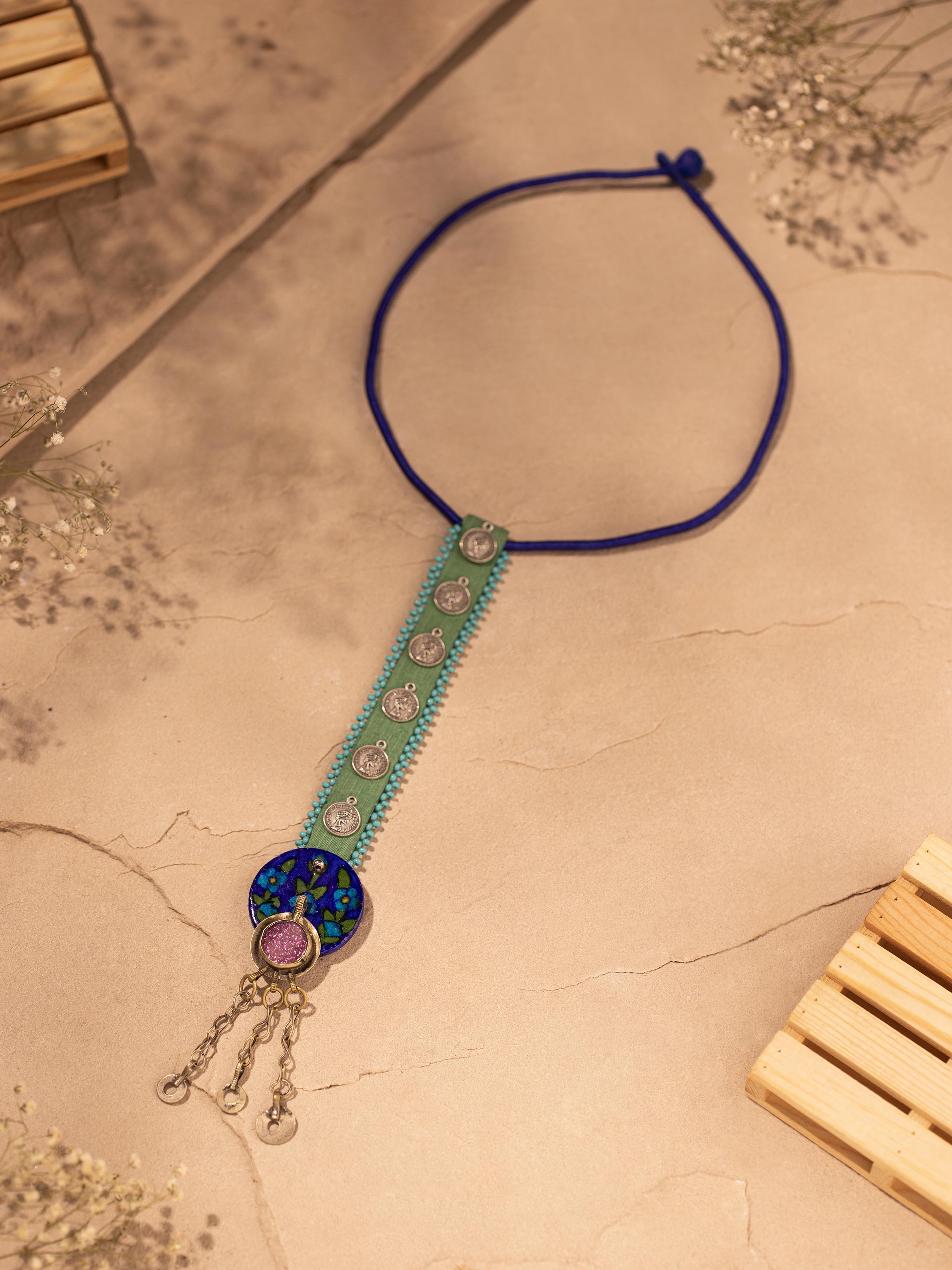 Side view of Ajrakh long necklace showcasing handcrafted detailing and length of the piece