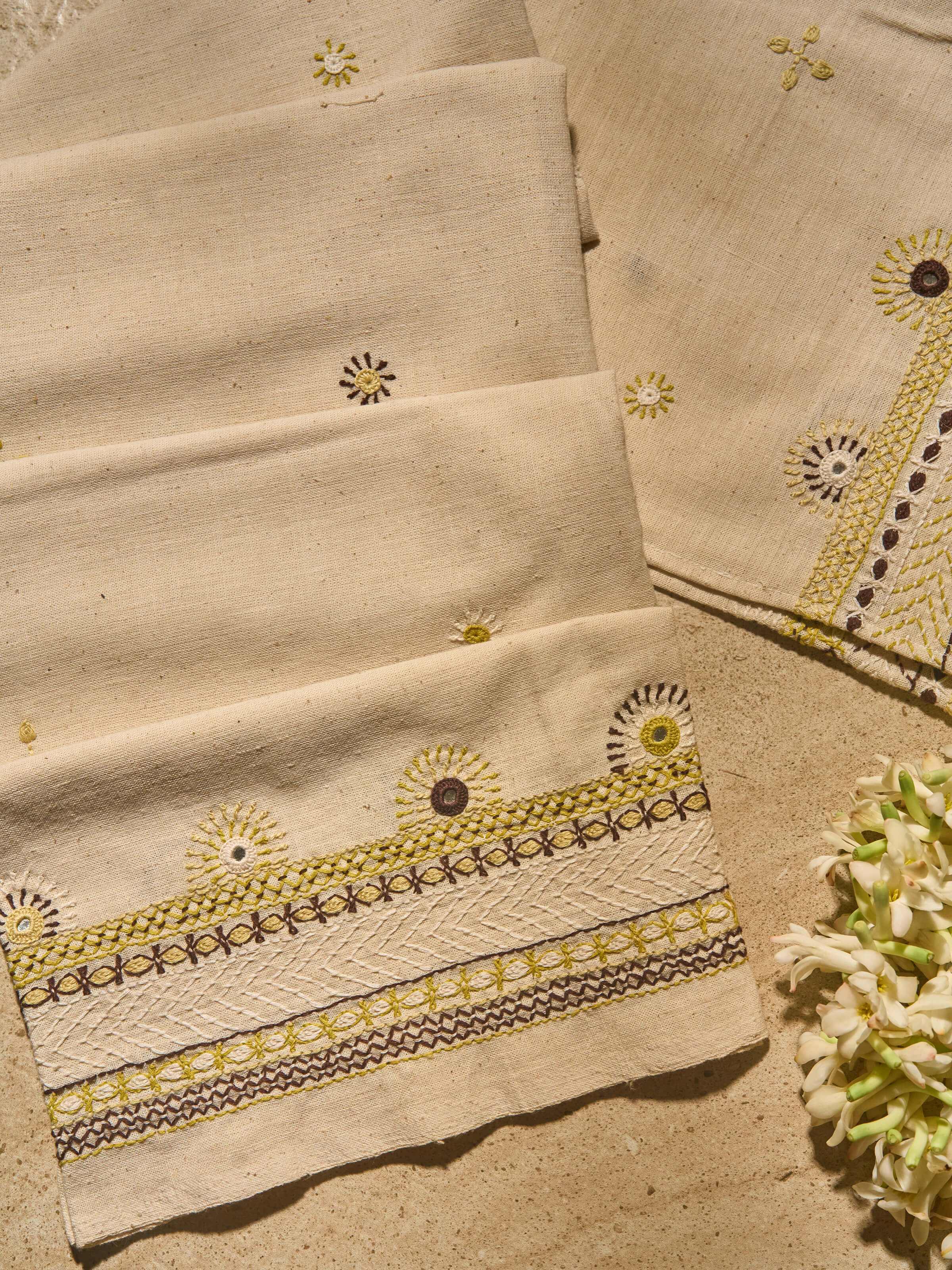Close-up to show the detailed needlework and cultural richness.