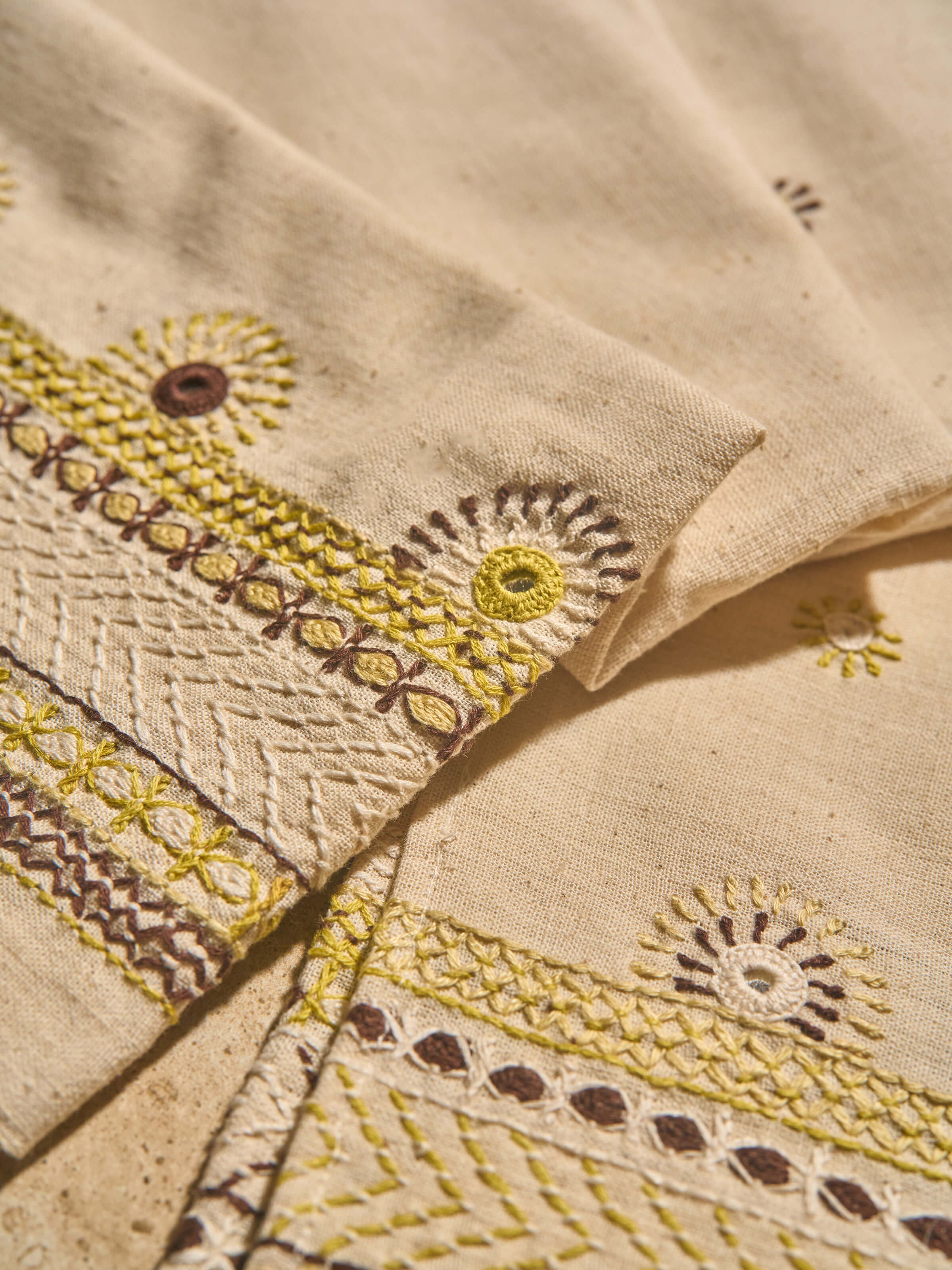 Side profile reveals the texture and understated elegance of the fabric.