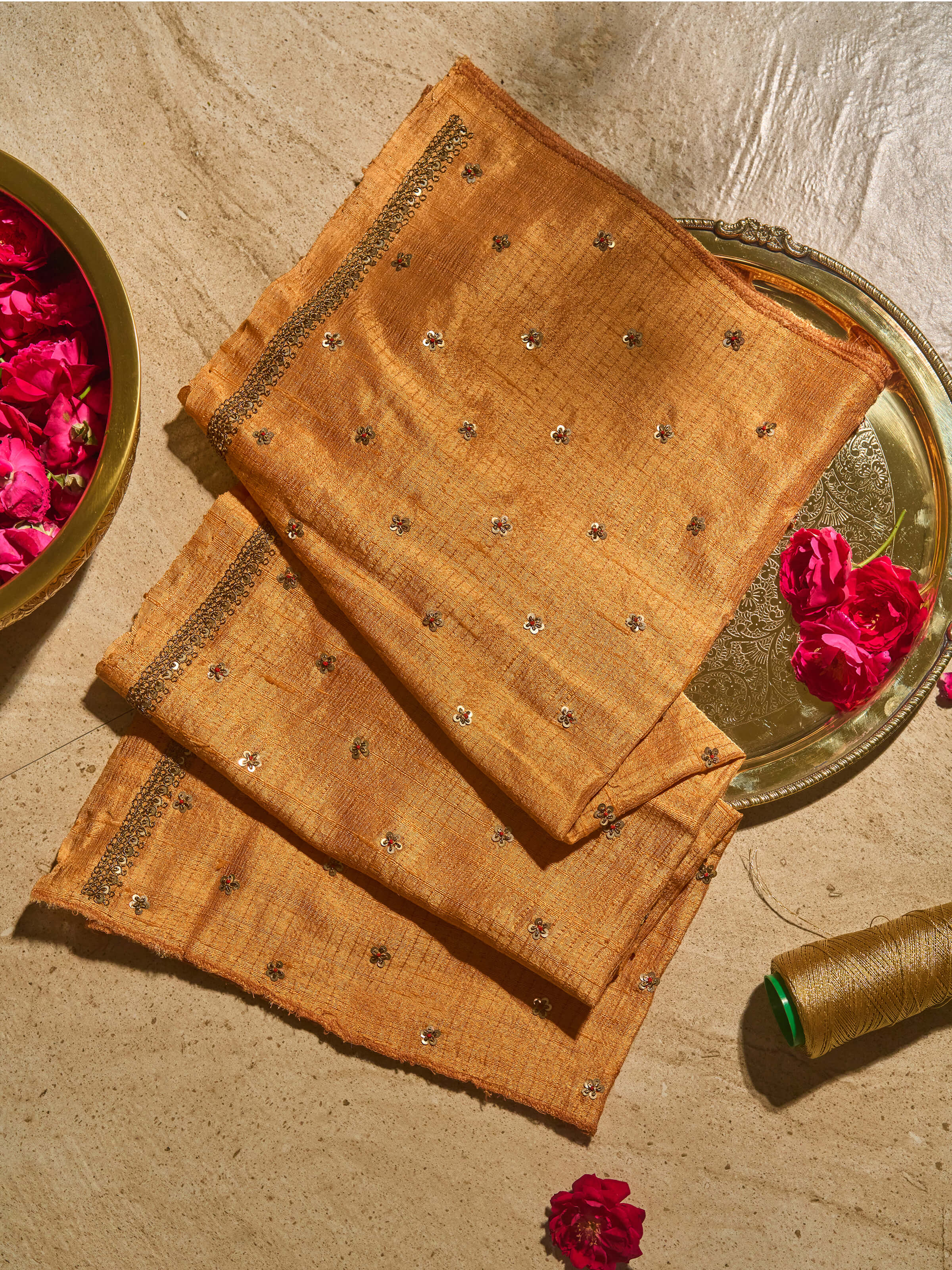 Lifestyle view of Rust Tussar Silk Zardozi Embroidered Blouse Piece showing embroidery details and fabric texture