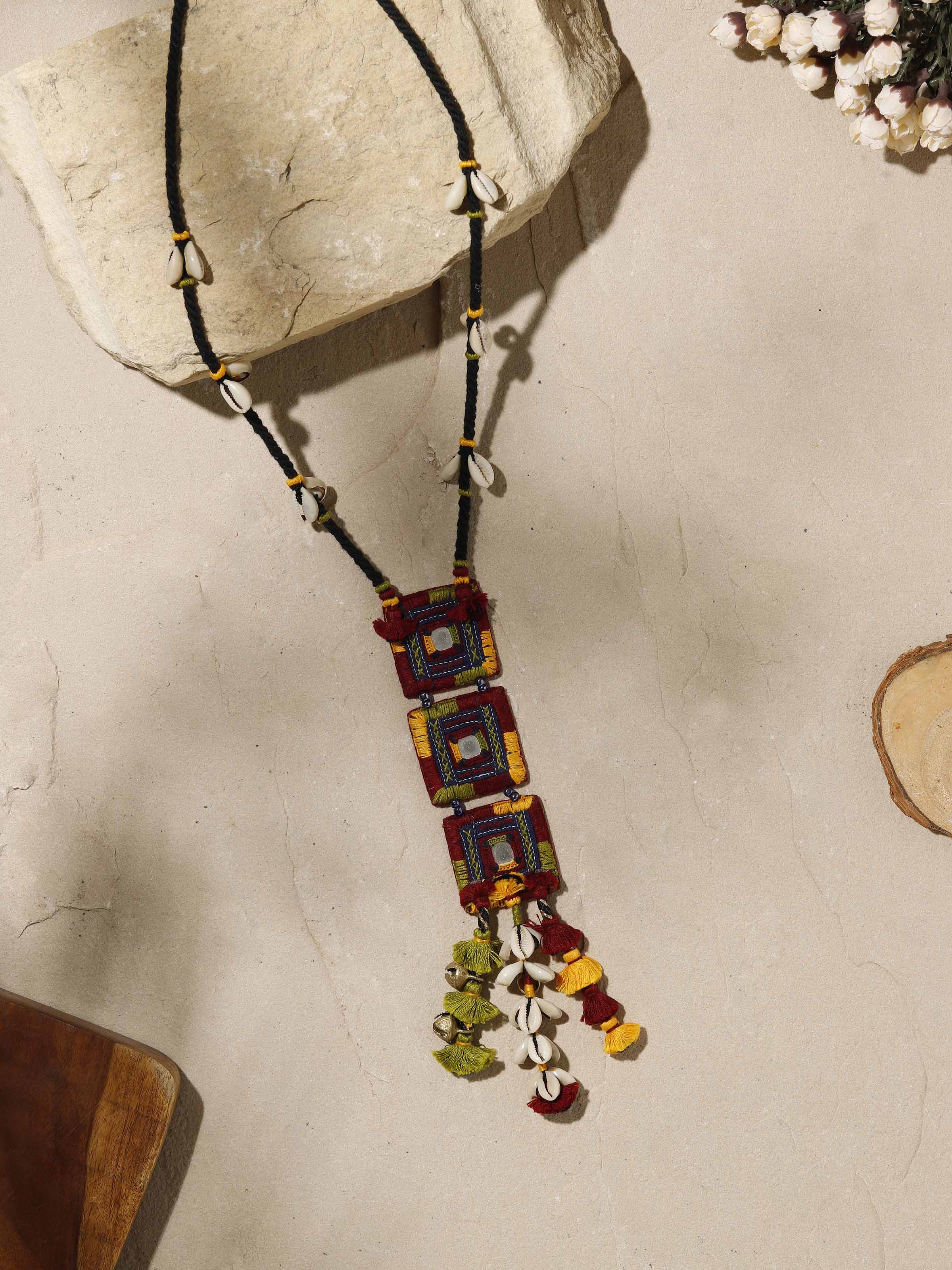 Close-up view of Banjara embroidery long necklace emphasizing the texture and craftsmanship of the embroidery.