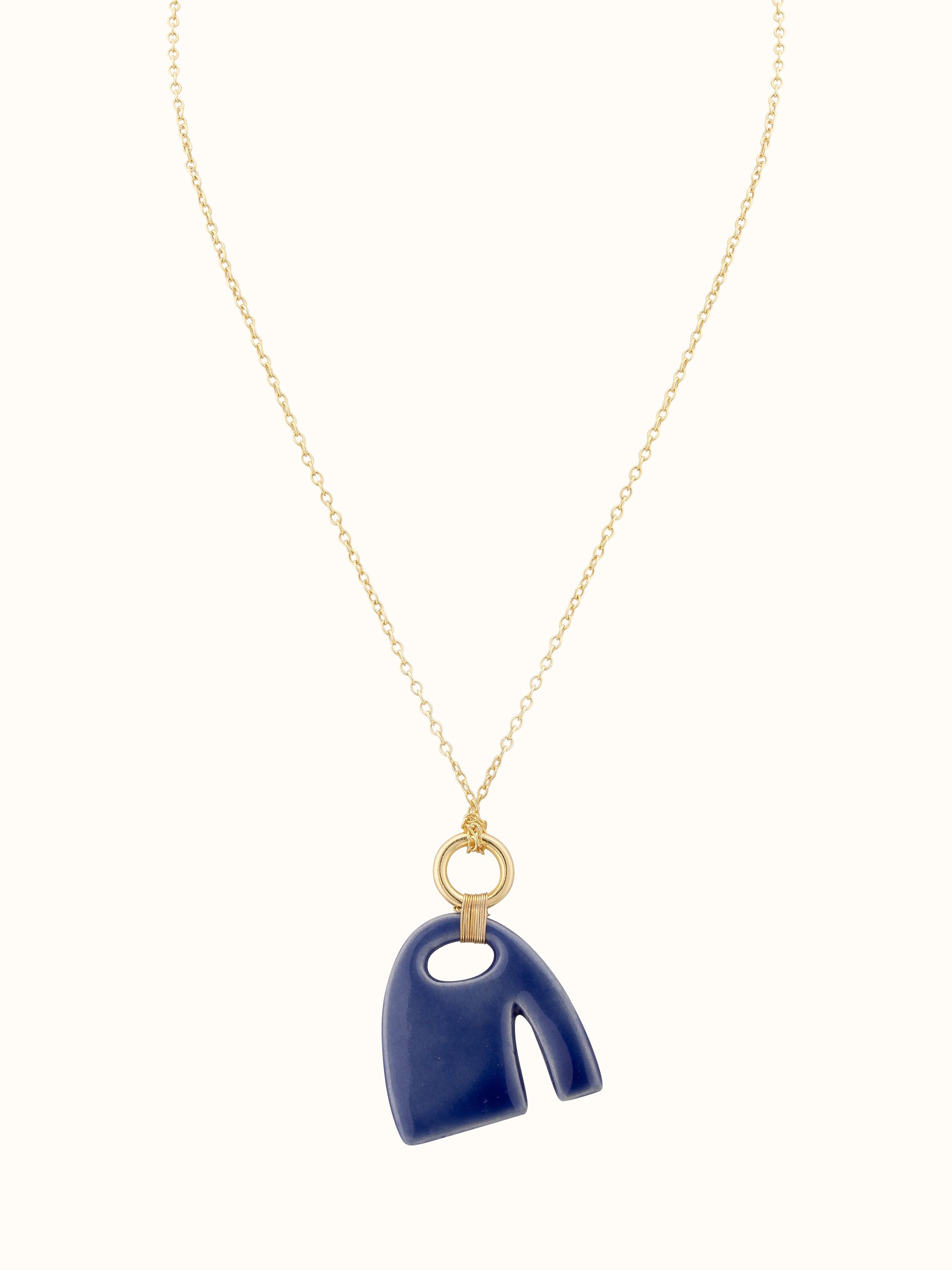 Front view of Beads & Brass Bells Collar Necklace showcasing the unique combination of beads and brass bells.