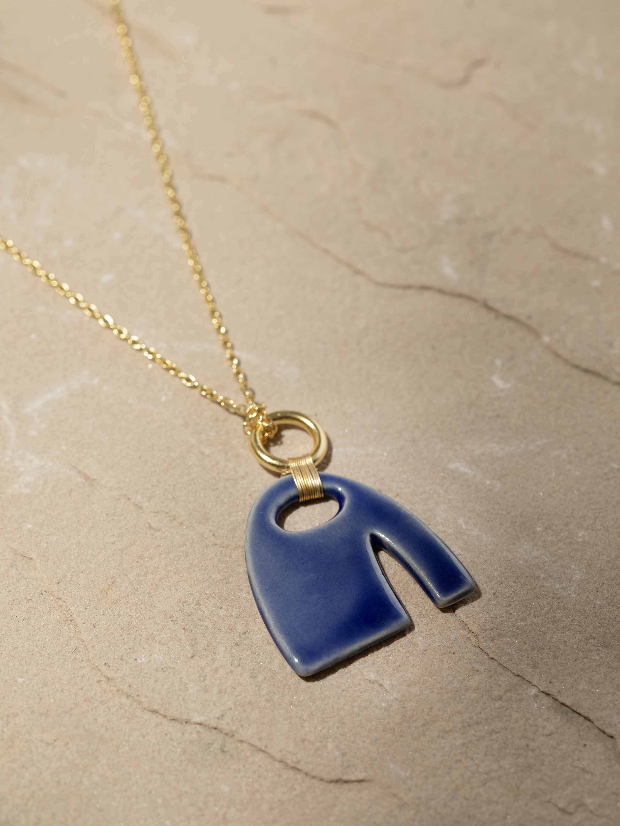 Detailed view of Beads & Brass Bells Collar Necklace highlighting the full design and intricate details.