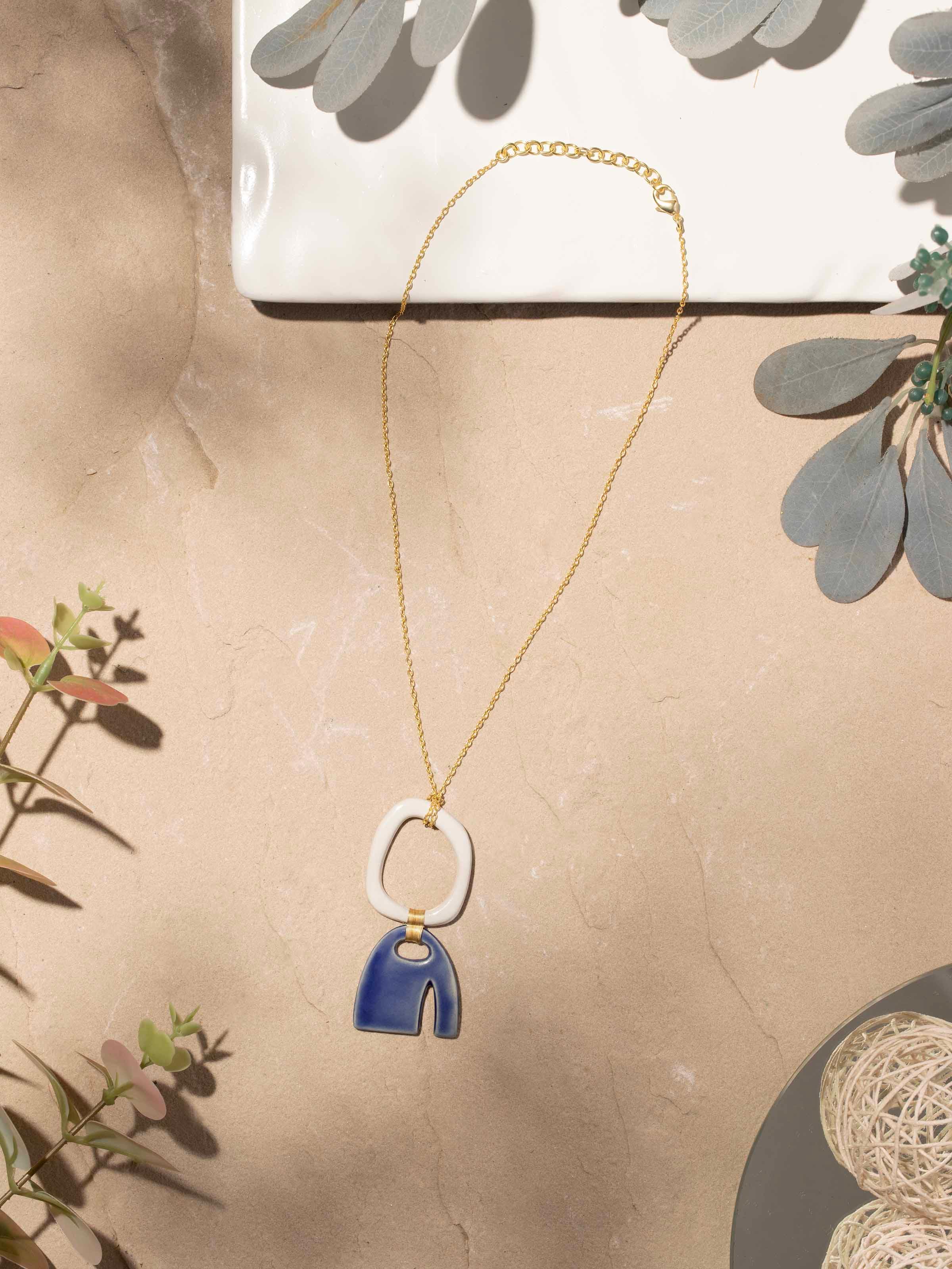 Side view of Ceramic Long Necklace highlighting the unique ceramic bead design and elegant chain.