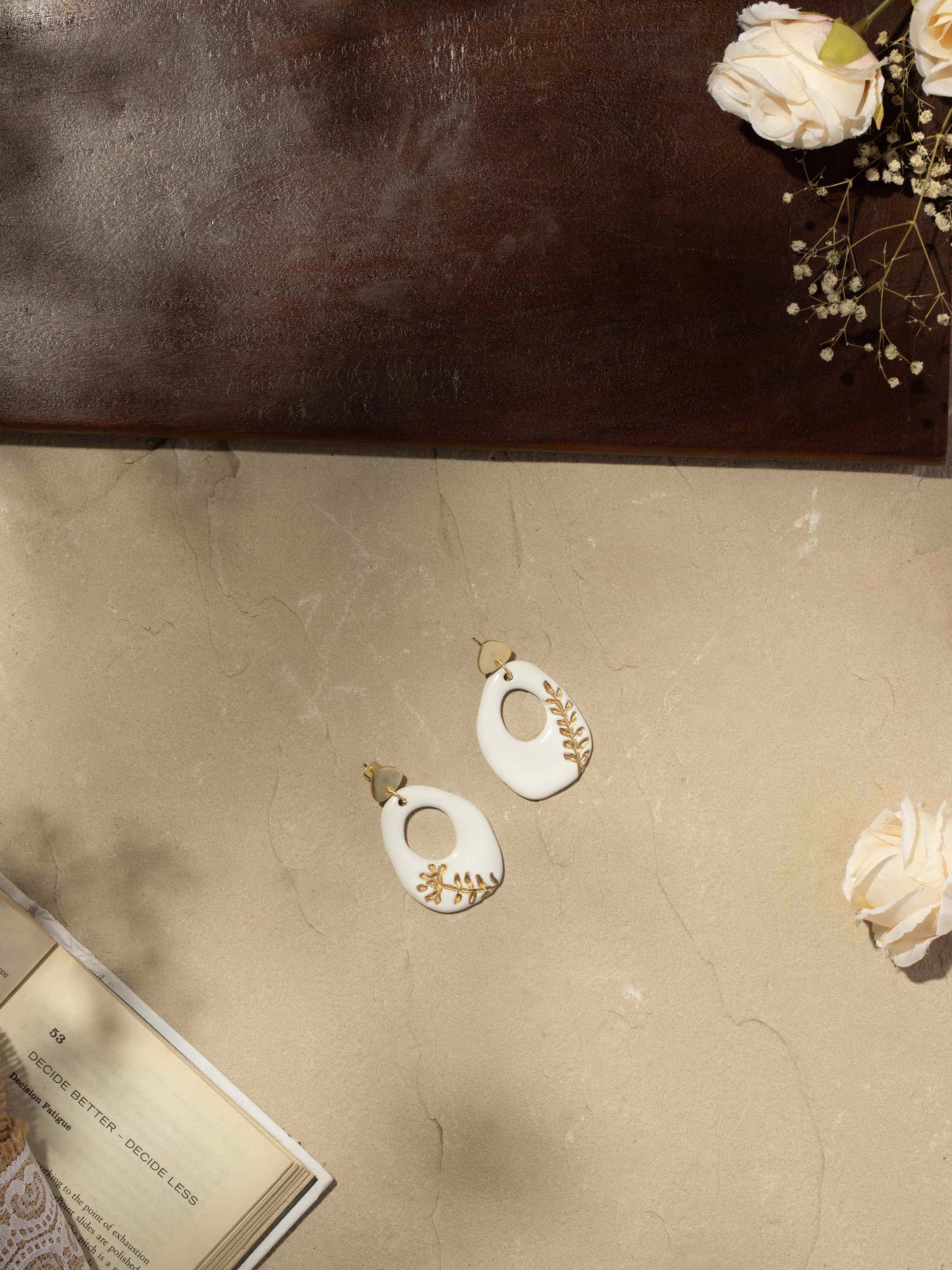 Side view of Ceramic Drop Earrings displaying their unique shape and style