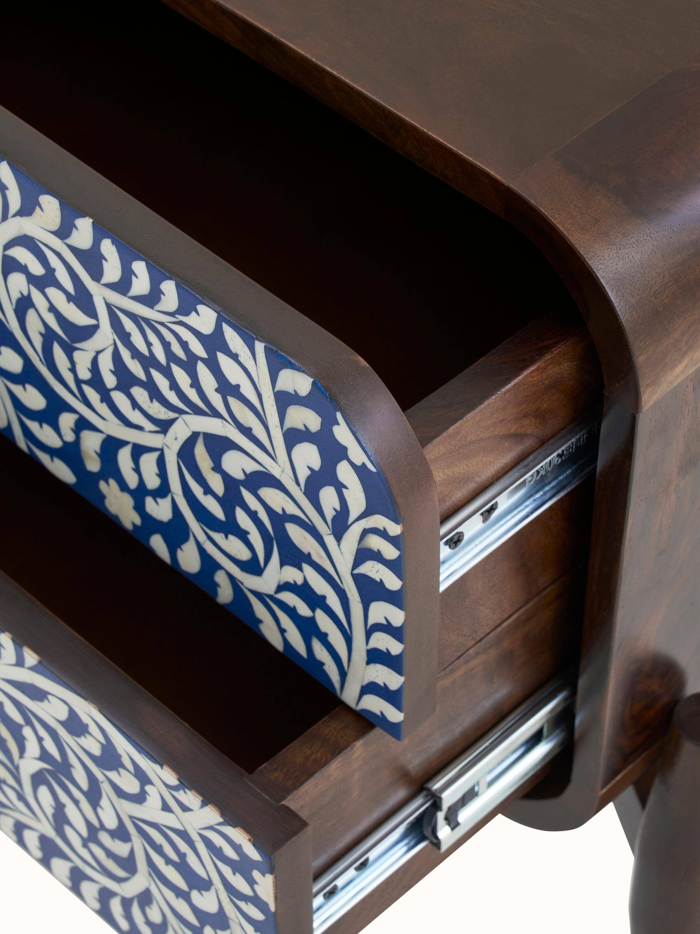 View of the miniature painted portable table in a setting, showcasing its practical use and aesthetic appeal.