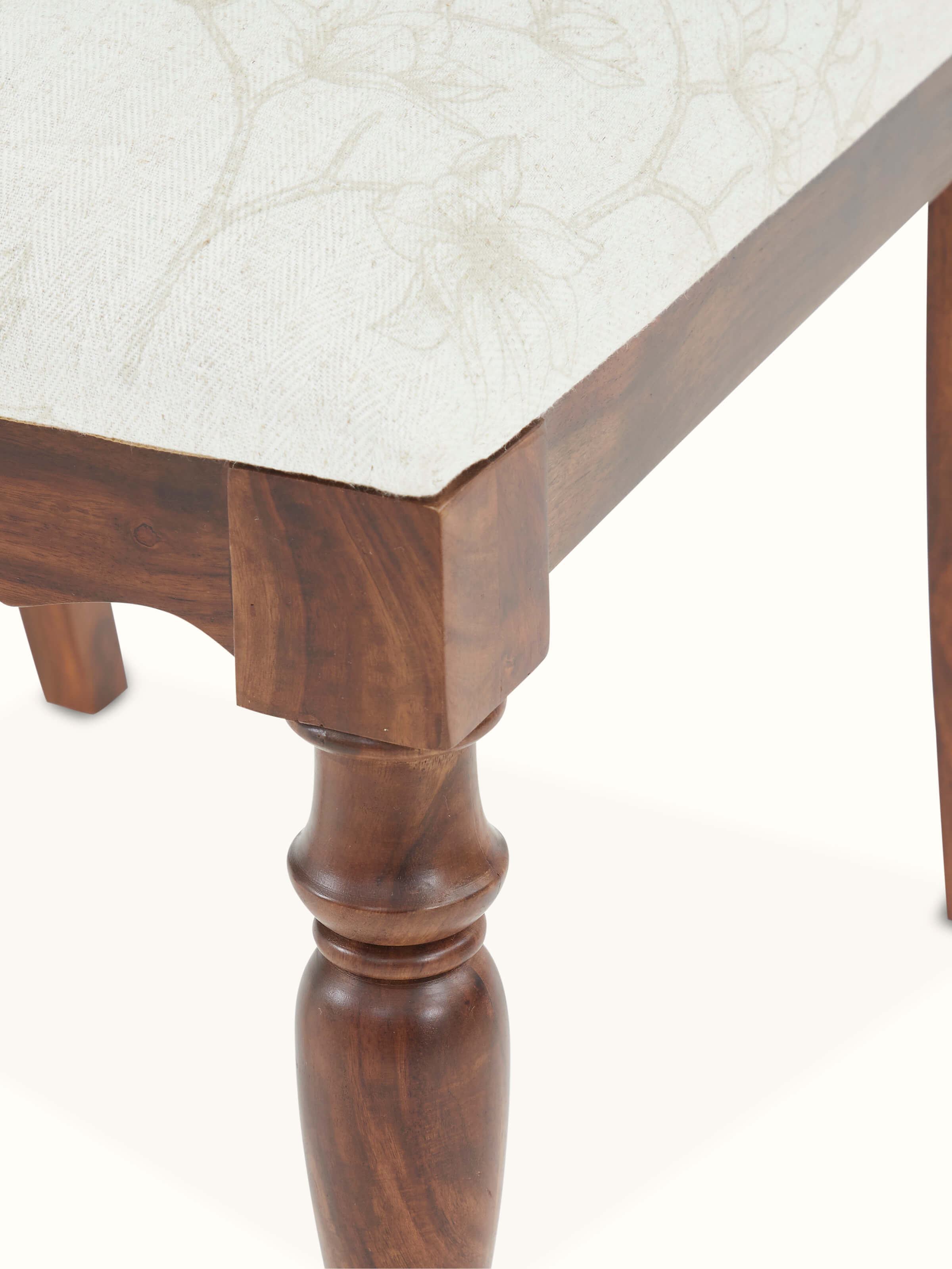 Back view of upholstered Sheesham wood dining chair, highlighting the sturdy backrest and elegant wood grain.