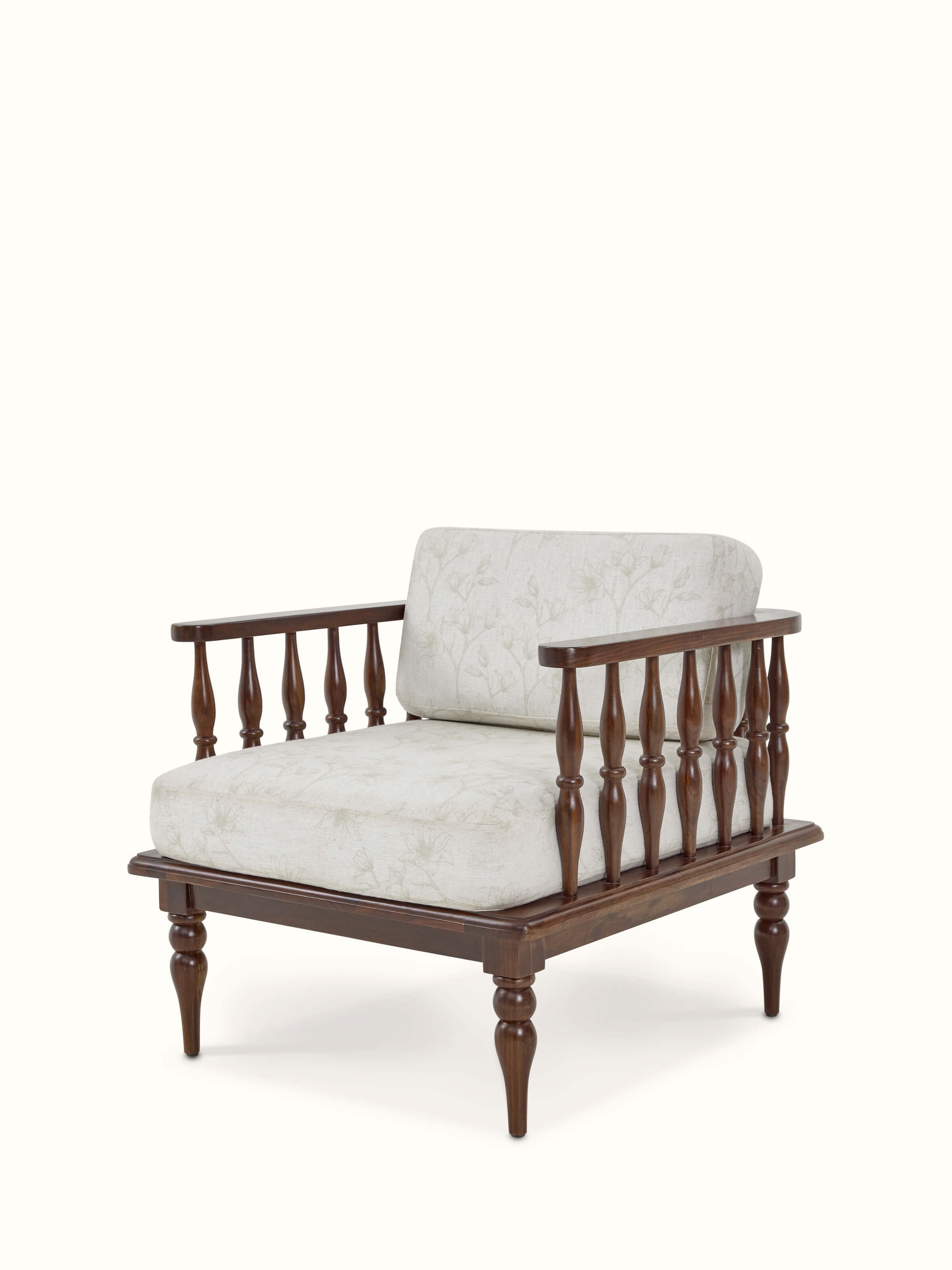Angled view of the teak finish upholstered sheesham wood 1-seater sofa, showing its sturdy frame and elegant design.