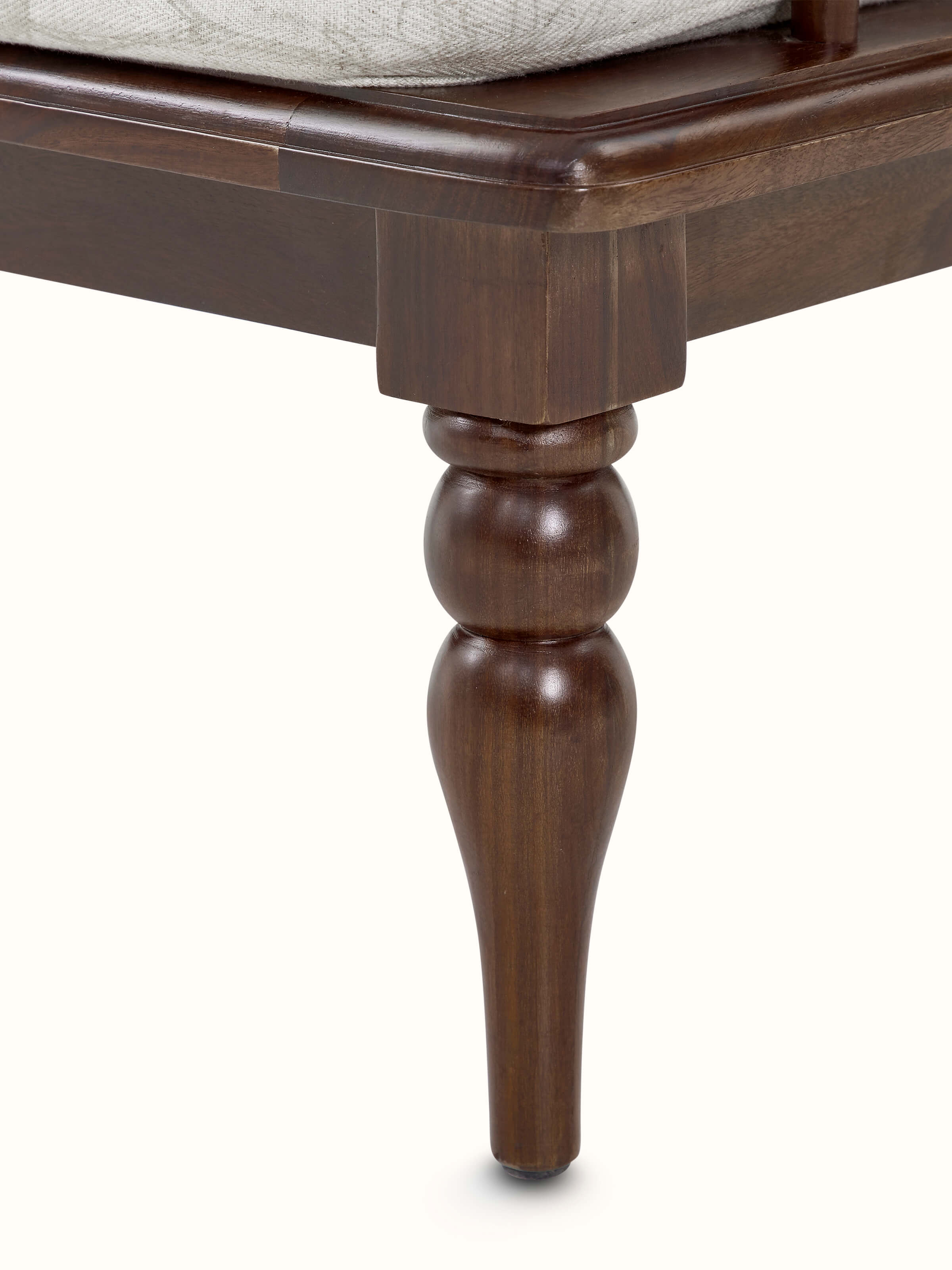 Close-up of the upholstery on the Sheesham wood 3-seater sofa, emphasizing the fabric texture and teak wood finish