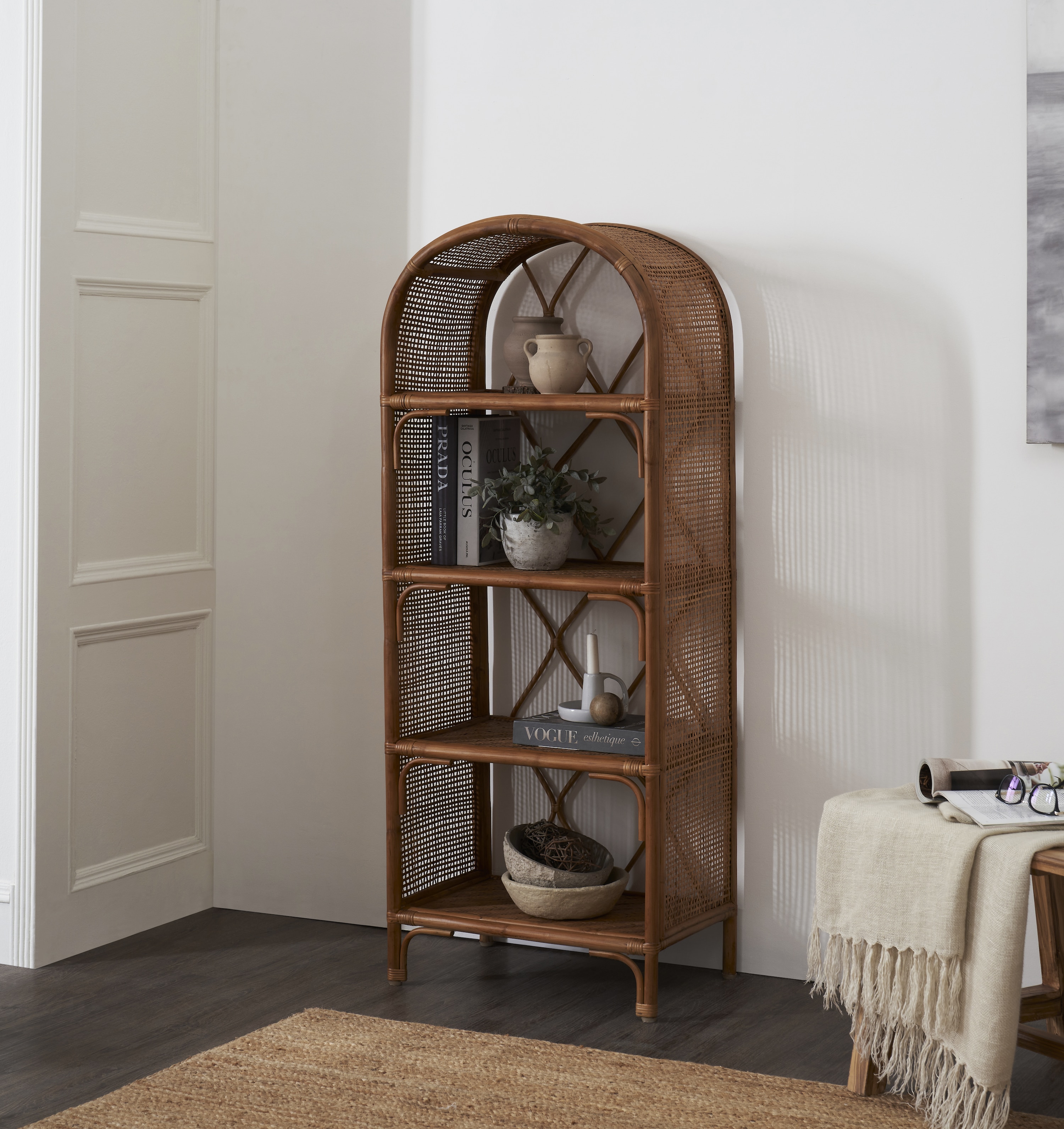 Side view of the cane bookshelf highlighting the intricate cane weaving and sturdy design