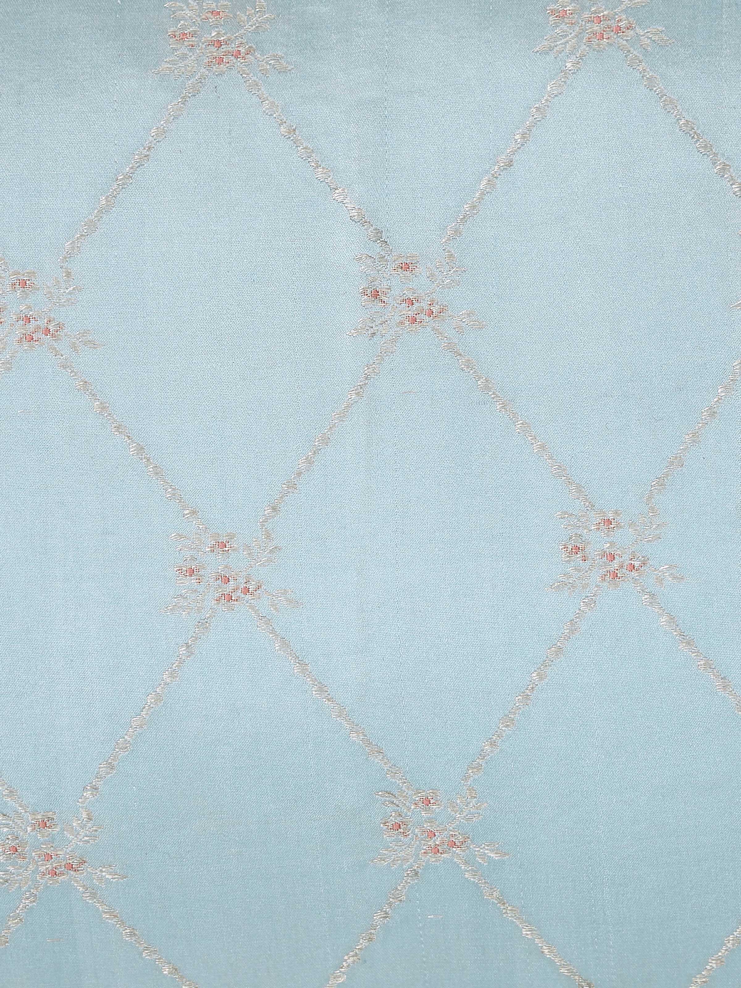 Close-up from side angle emphasizing trellis motif and fine finish.