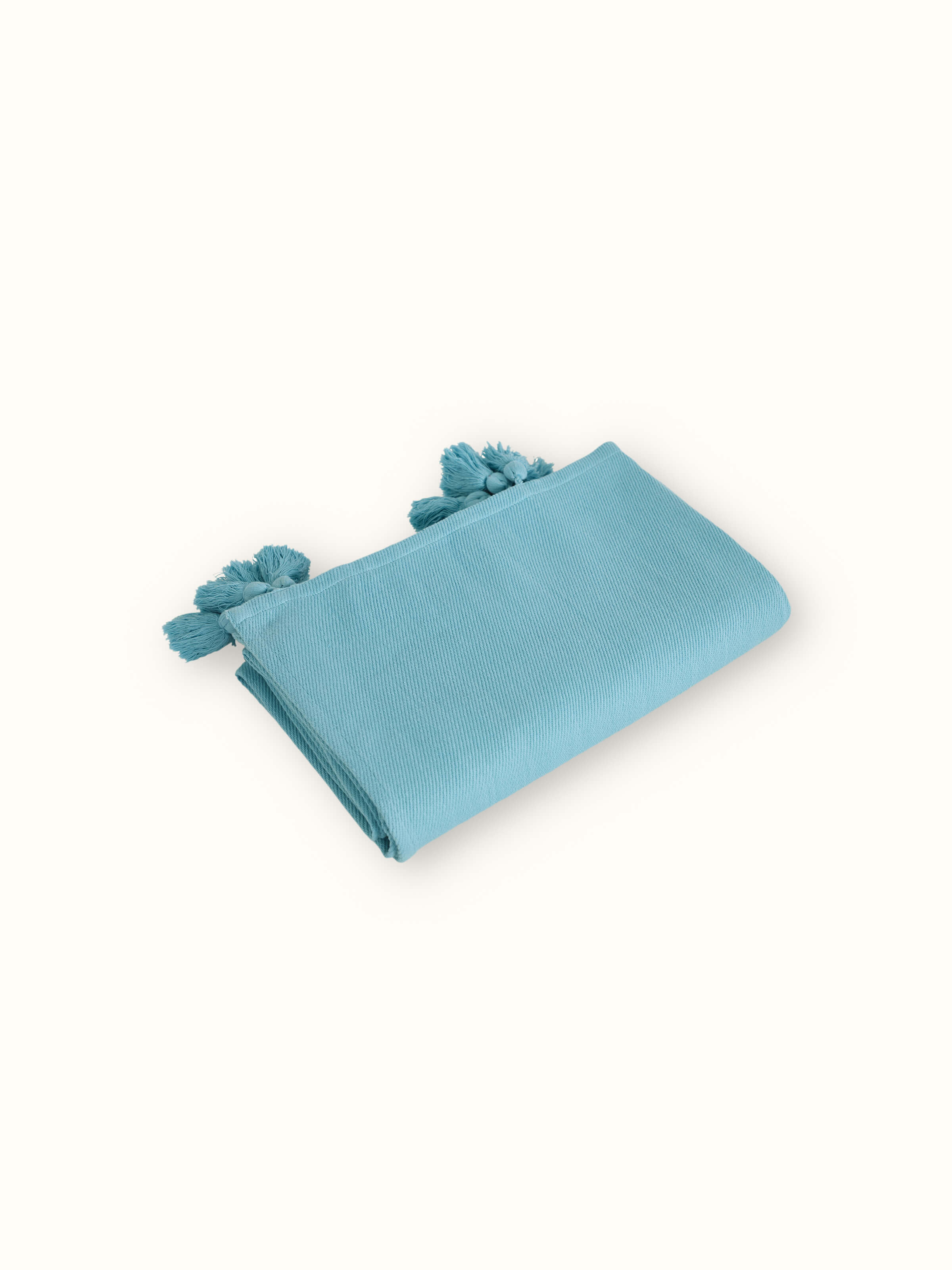 Detailed view of Tavas turquoise twill cotton handloom throw highlighting the twill pattern and fabric finish