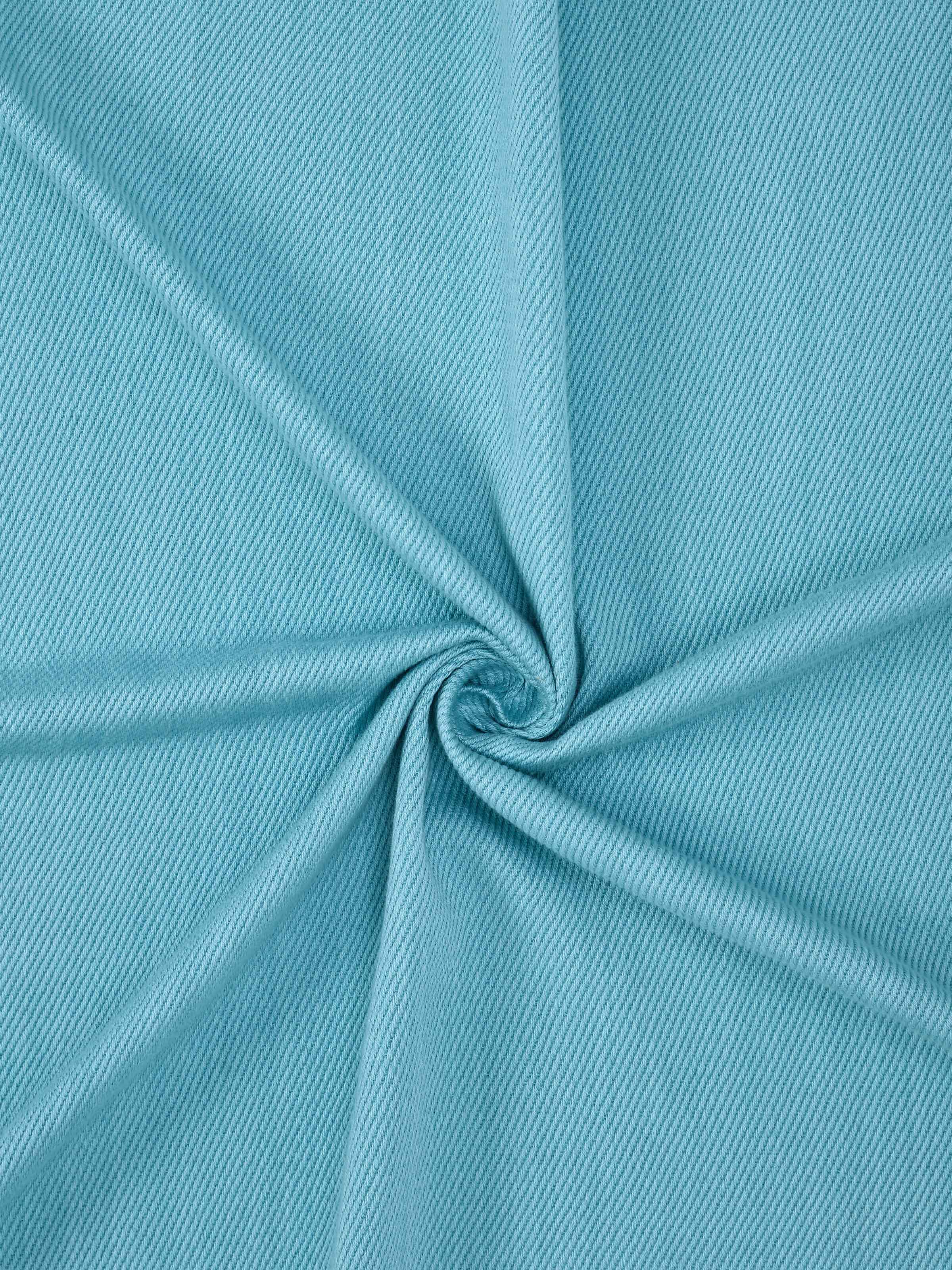 Close-up of Tavas turquoise twill cotton handloom throw showing the texture and craftsmanship of the handloom fabric