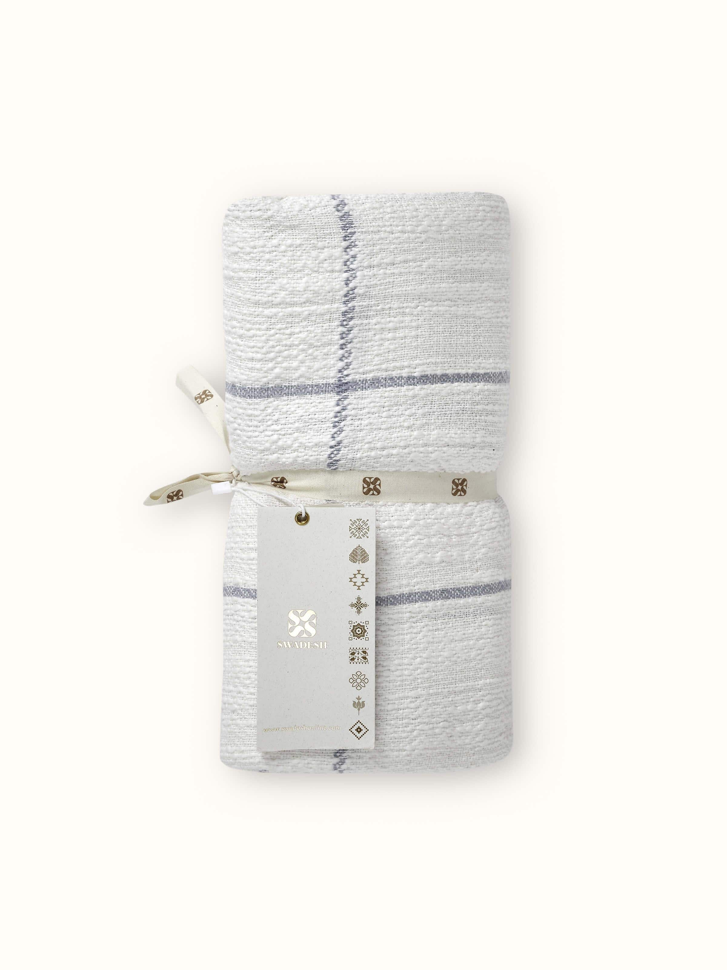 Close-up of Adhima grey twill cotton handloom throw demonstrating its rich grey hue and handloom craftsmanship