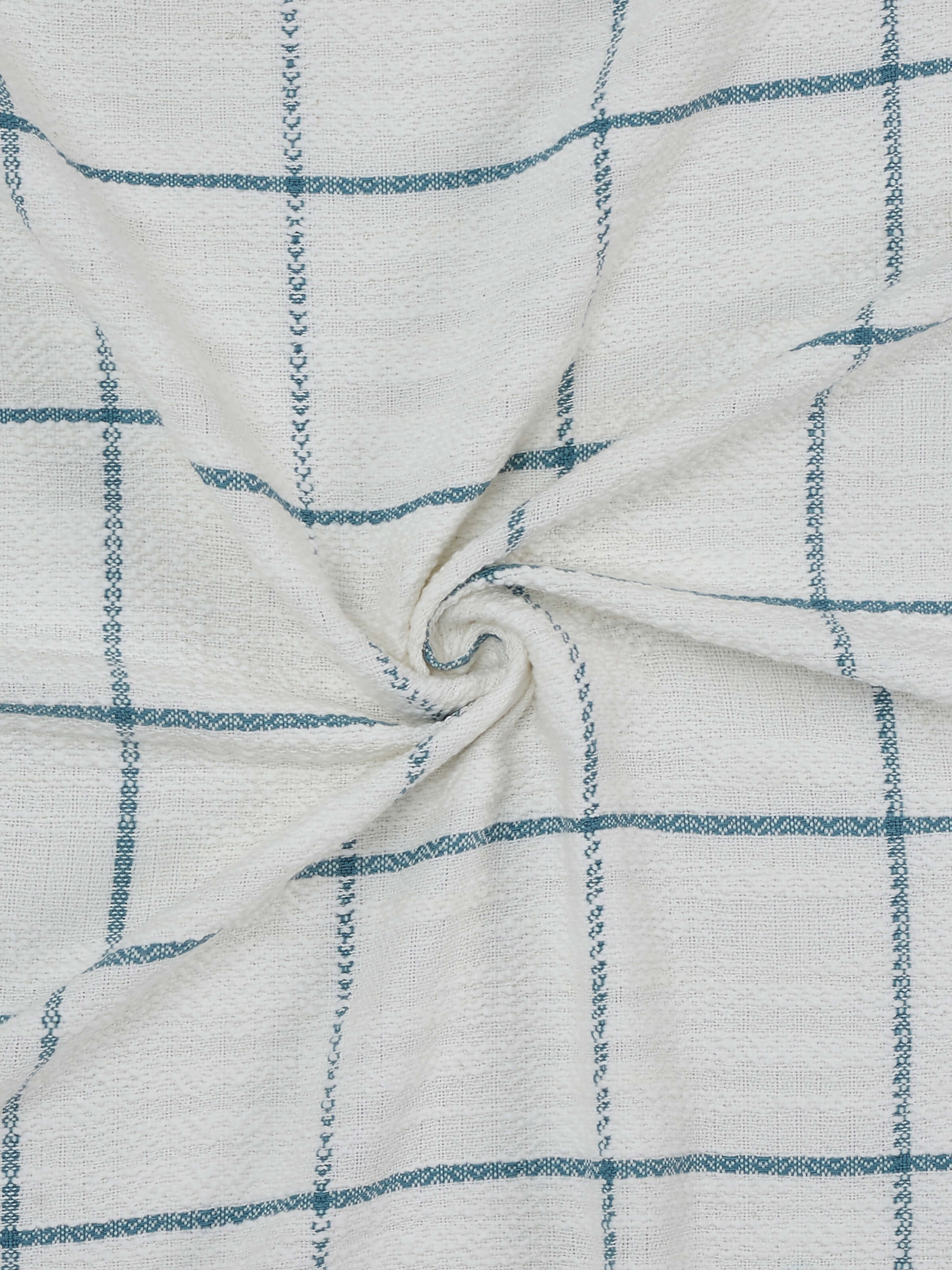 Angled view of the Turquoise Throw, capturing the flow and fabric drape.