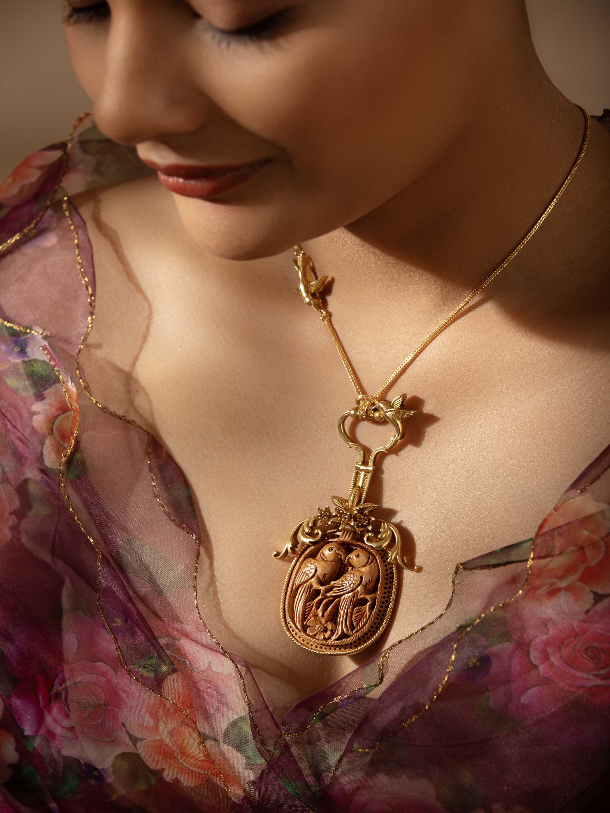 Lifestyle view showing wooden and silver necklace styled over ethnic outfit