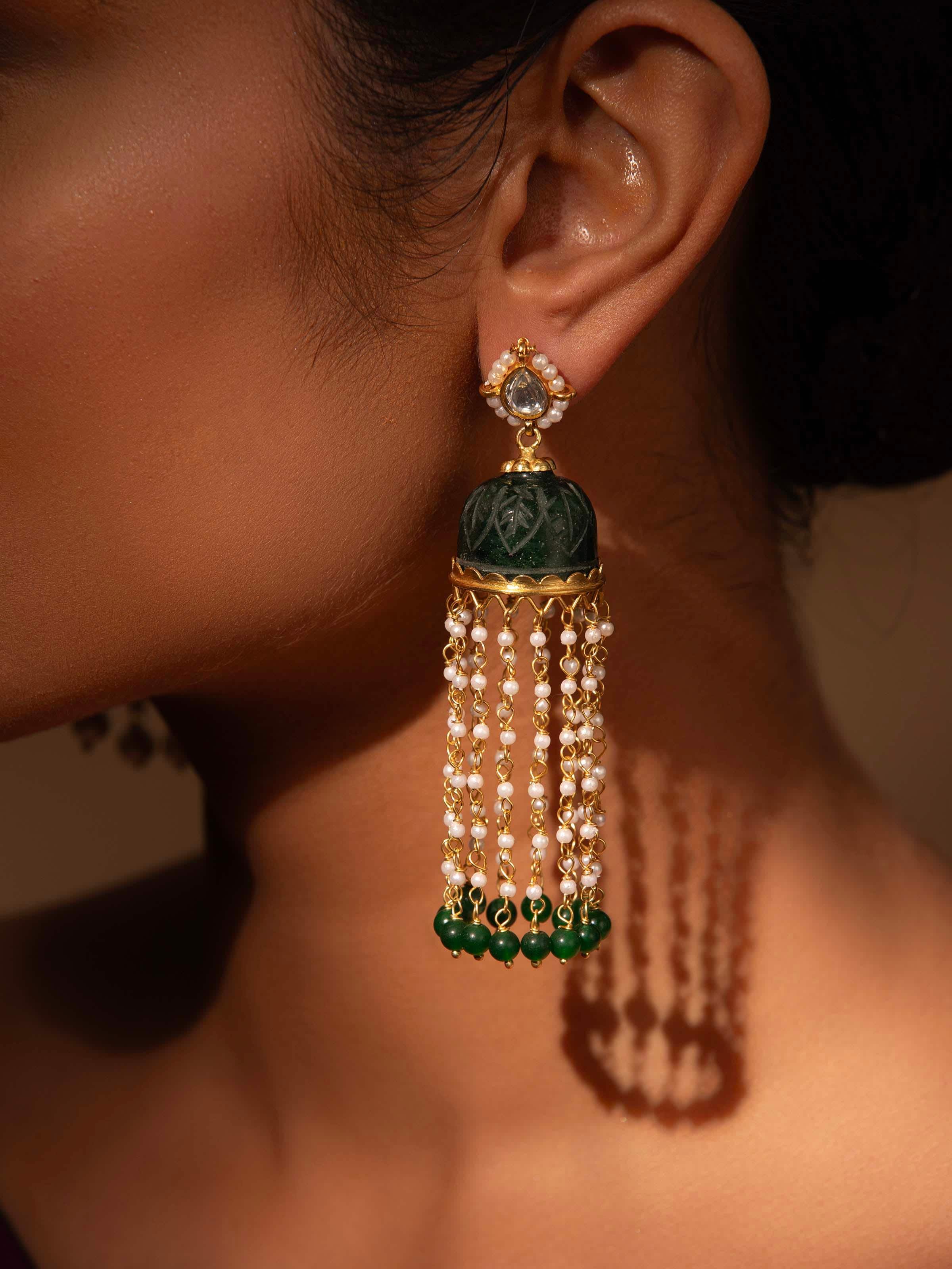 Side view of Silver Smithing Jhumkas highlighting the detailed metalwork and elegant drop design.