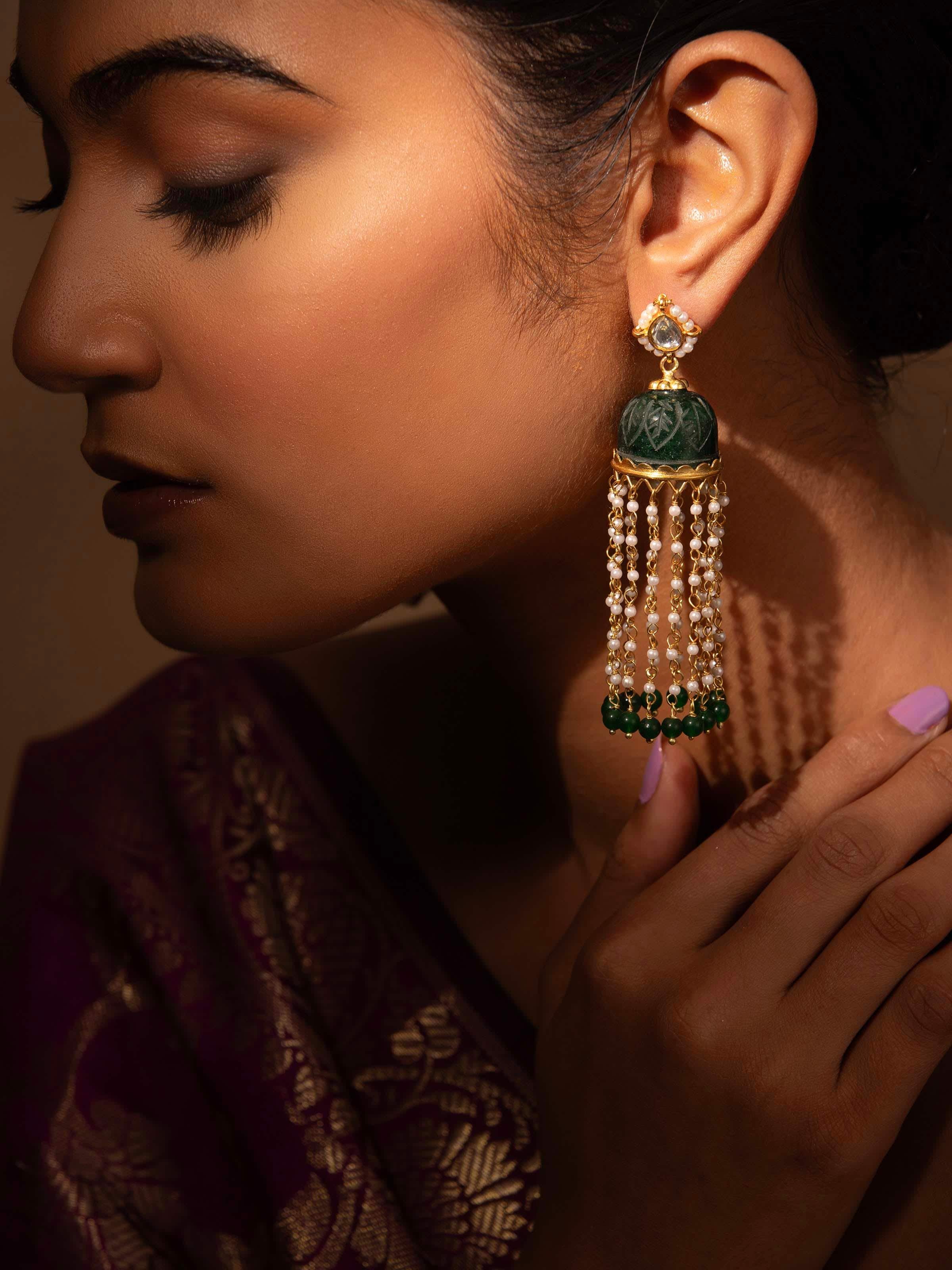 Close-up view of Silver Smithing Jhumkas showcasing intricate craftsmanship and fine detailing.